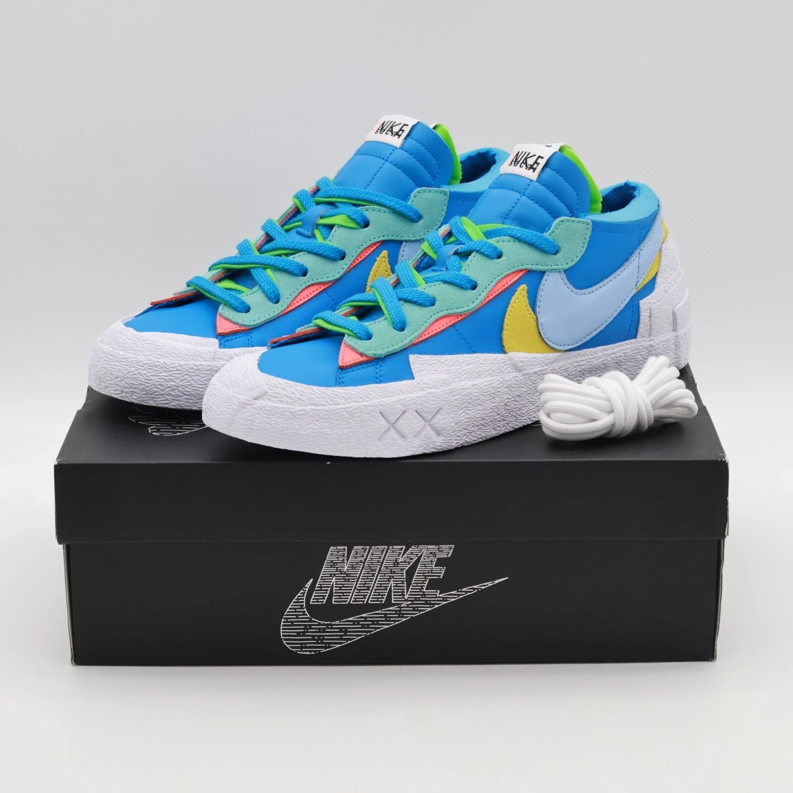 Size 7 - DM7901-400 KAWS x sacai x Nike Blazer Low Neptune Blue (Men's)