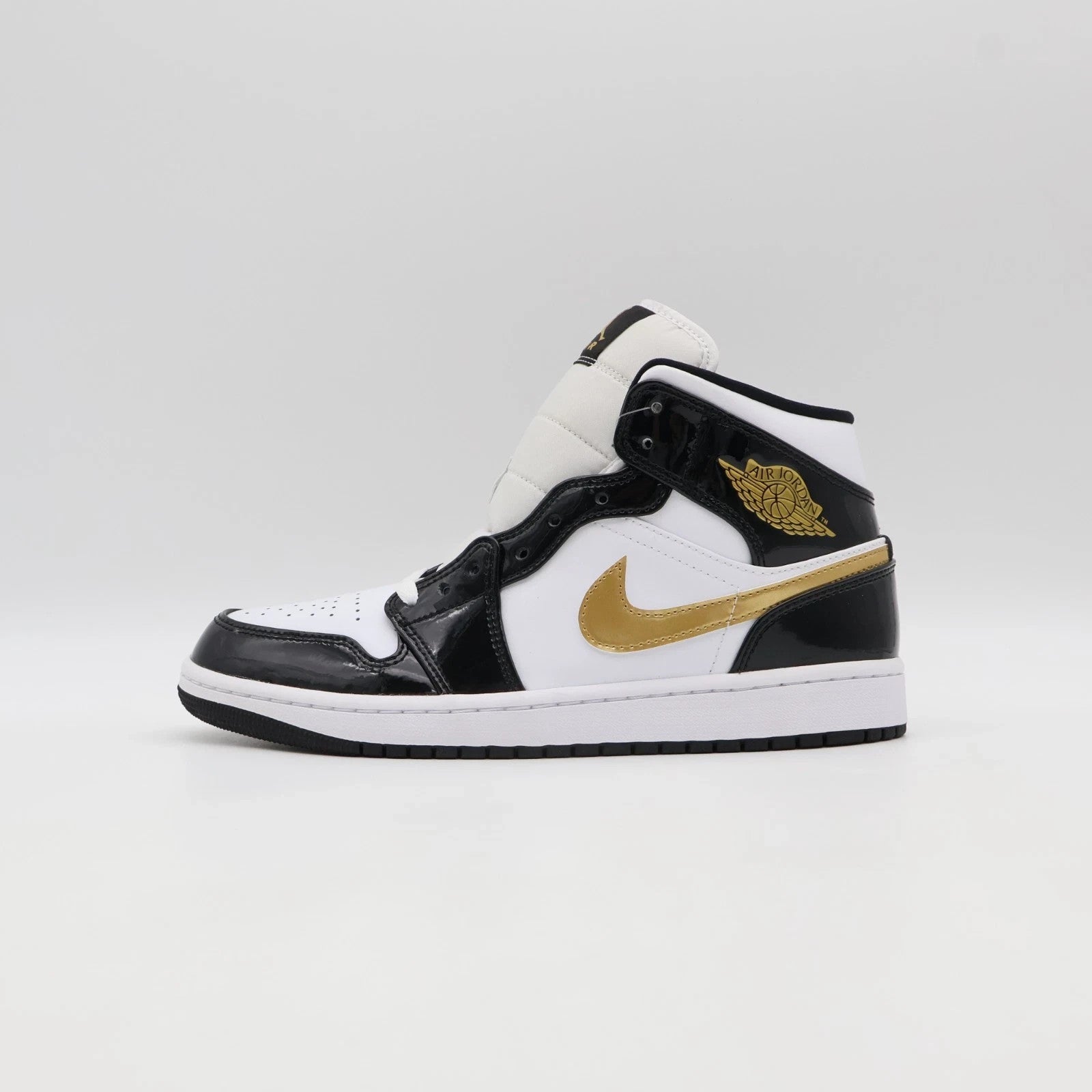 Size 11 - 852542-007 Jordan 1 Mid SE Patent Black Gold (Men's)