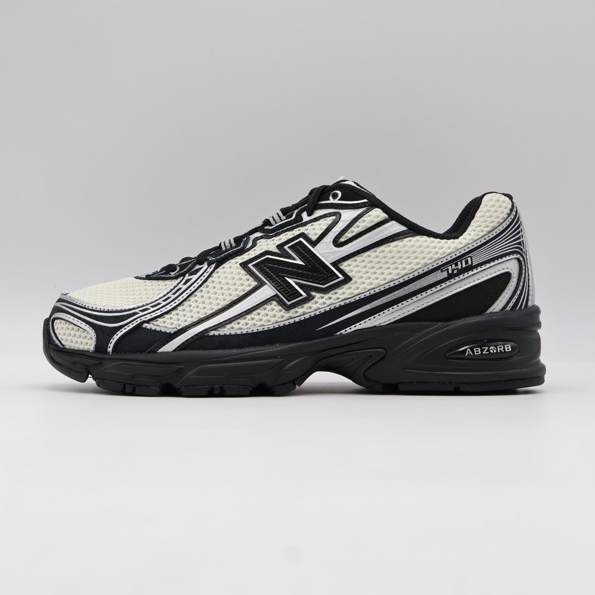 U7407XT New Balance 740 Black/Angora/Silver Metallic (Men's)