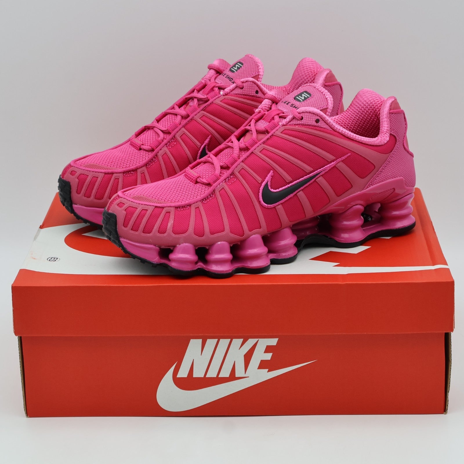 IH1338-600 Nike Shox TL Desert Pink Black (Men's)