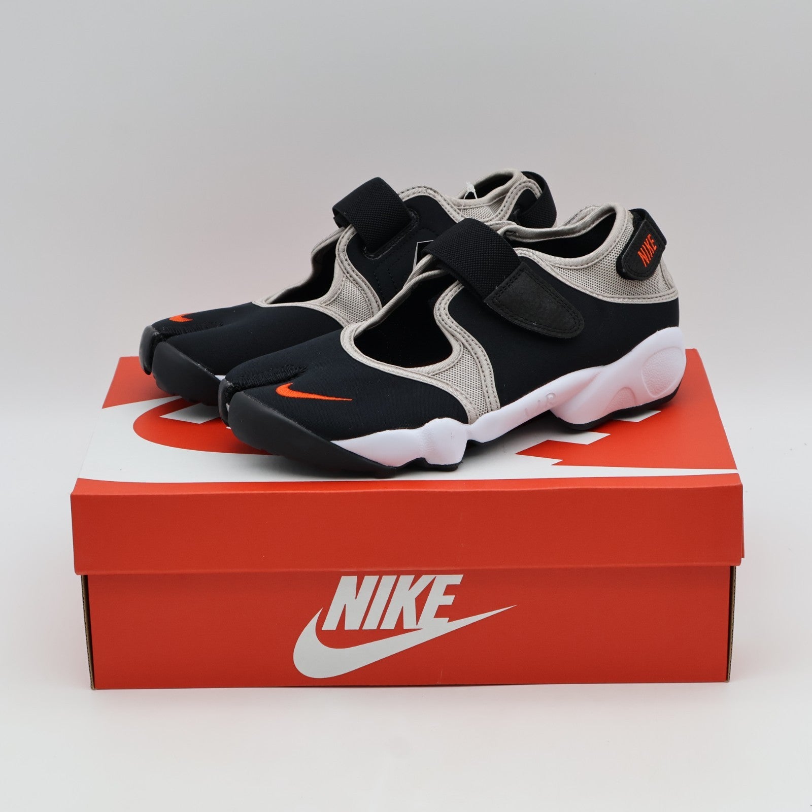 IW1244-010 Nike Air Rift "Black/College Grey" (Men's)