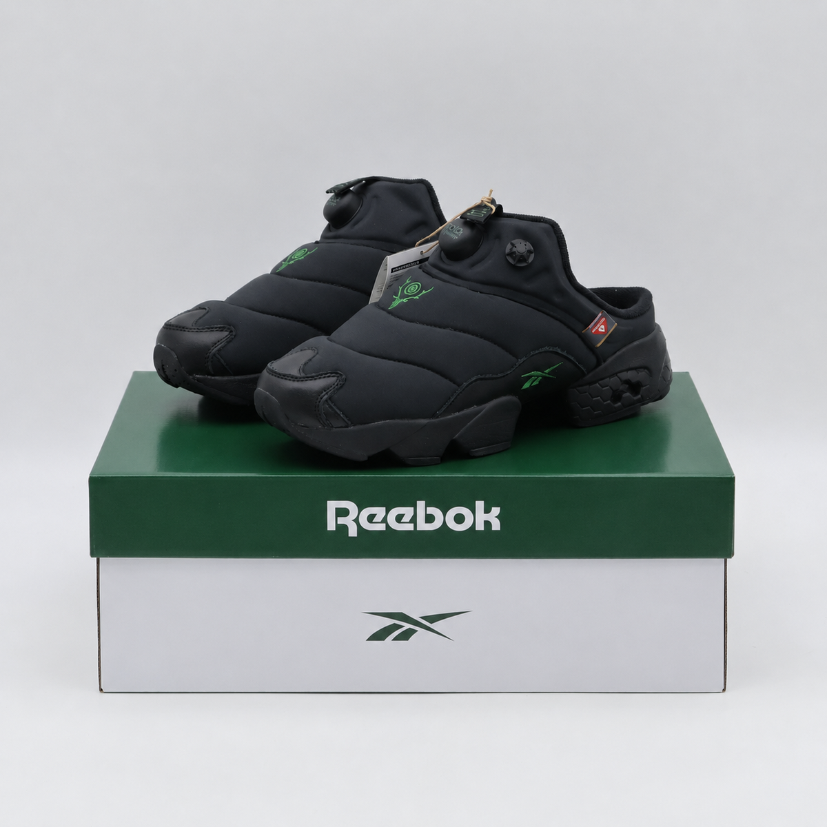 100217328 South2 West8 Reebok Instapump Fury Mule Black Black Green (Men's)