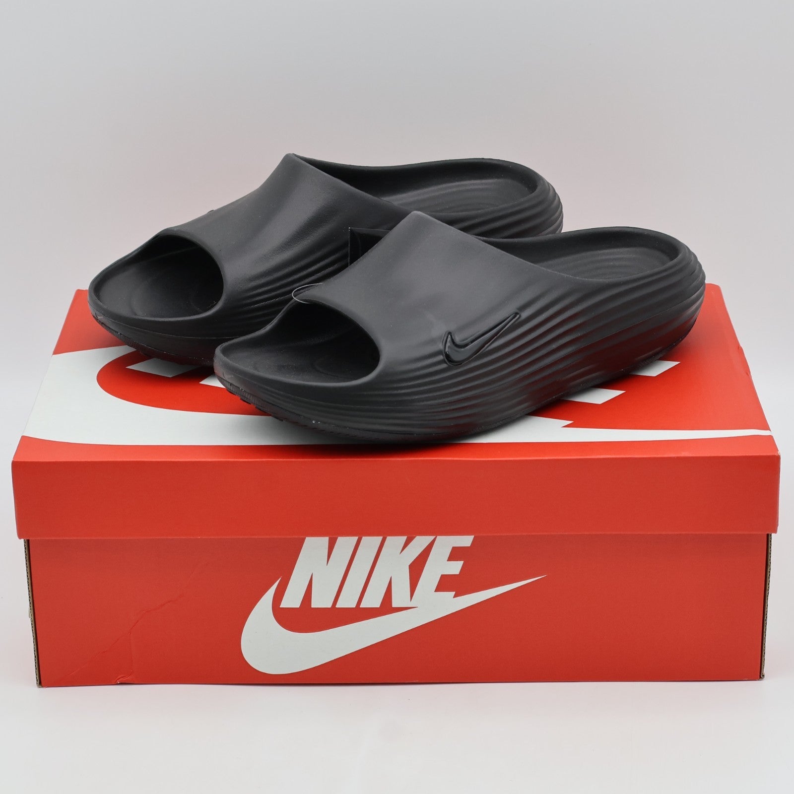 HV4479-001 Nike ReactX Rejuven8 Triple Black (Men's)