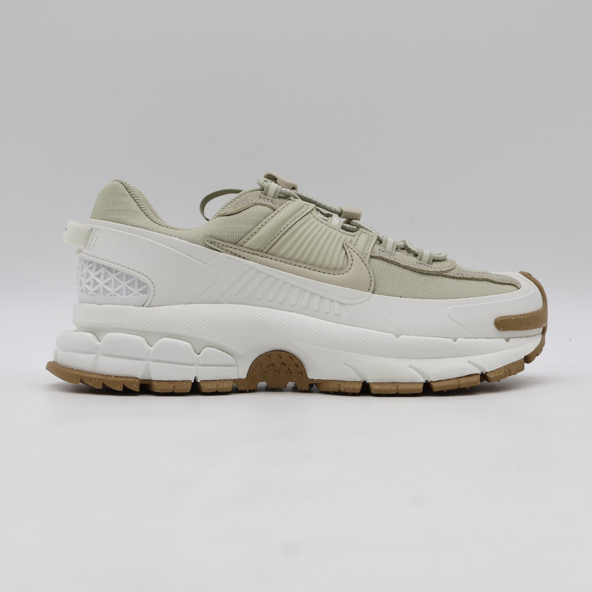 HQ2181-100 Nike Zoom Vomero Roam Sail Gum Light Brown Racer Blue (Women's)