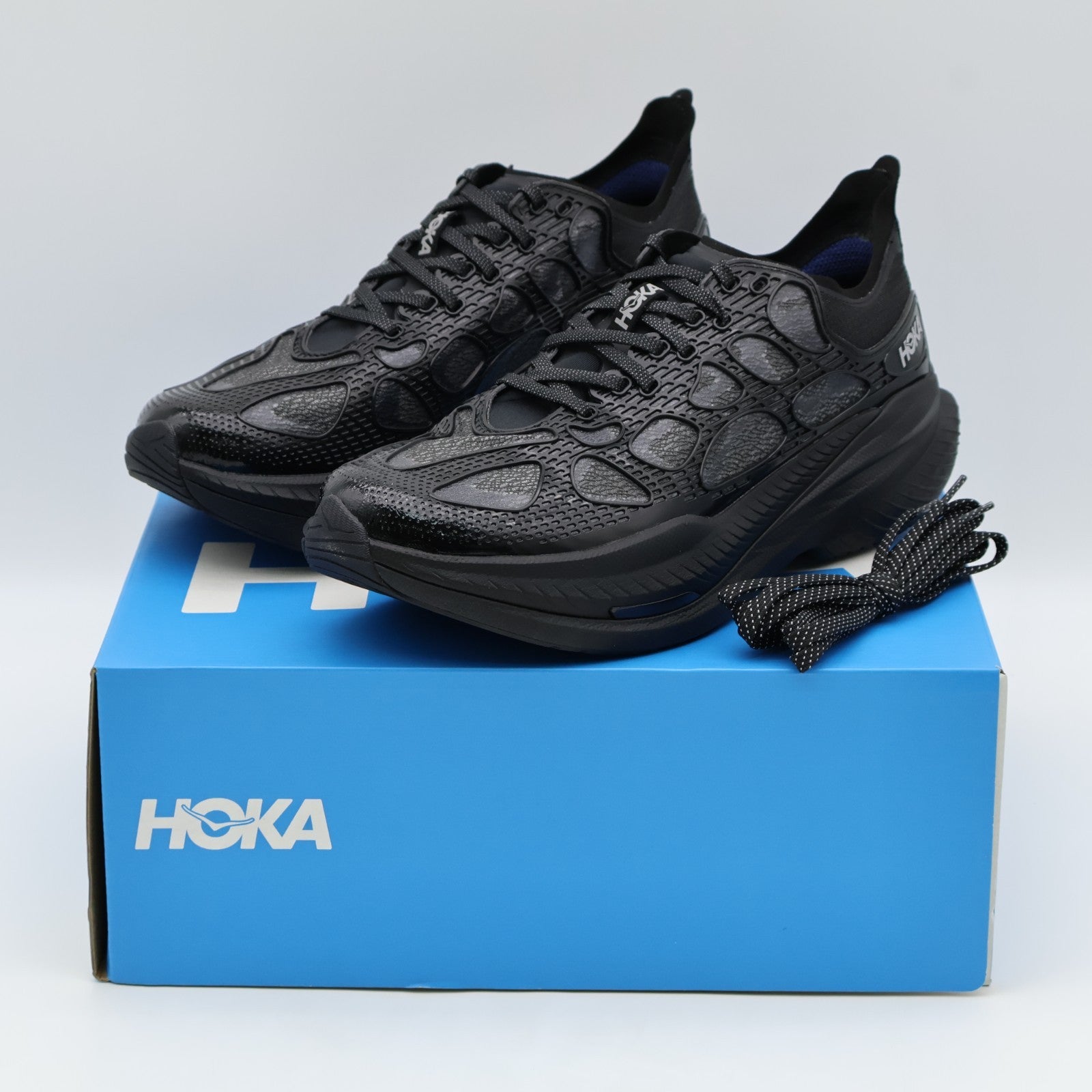 1168932-bmd Hoka Mach X Caged Black Midnightblued (Men's)