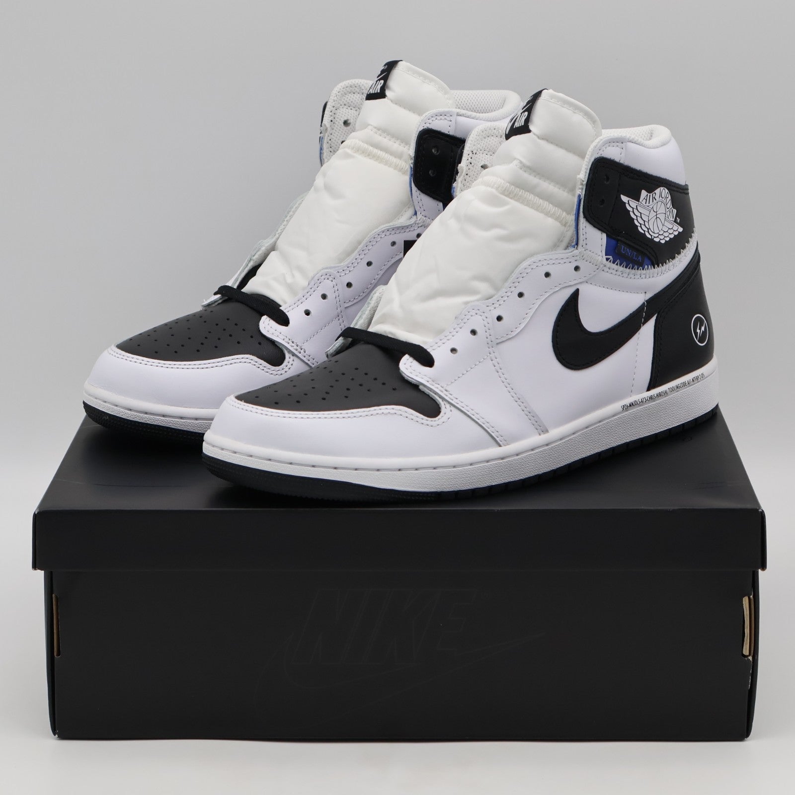 II7282-100 fragment design à UNION à Nike Air Jordan 1 Retro High OG (Men's)