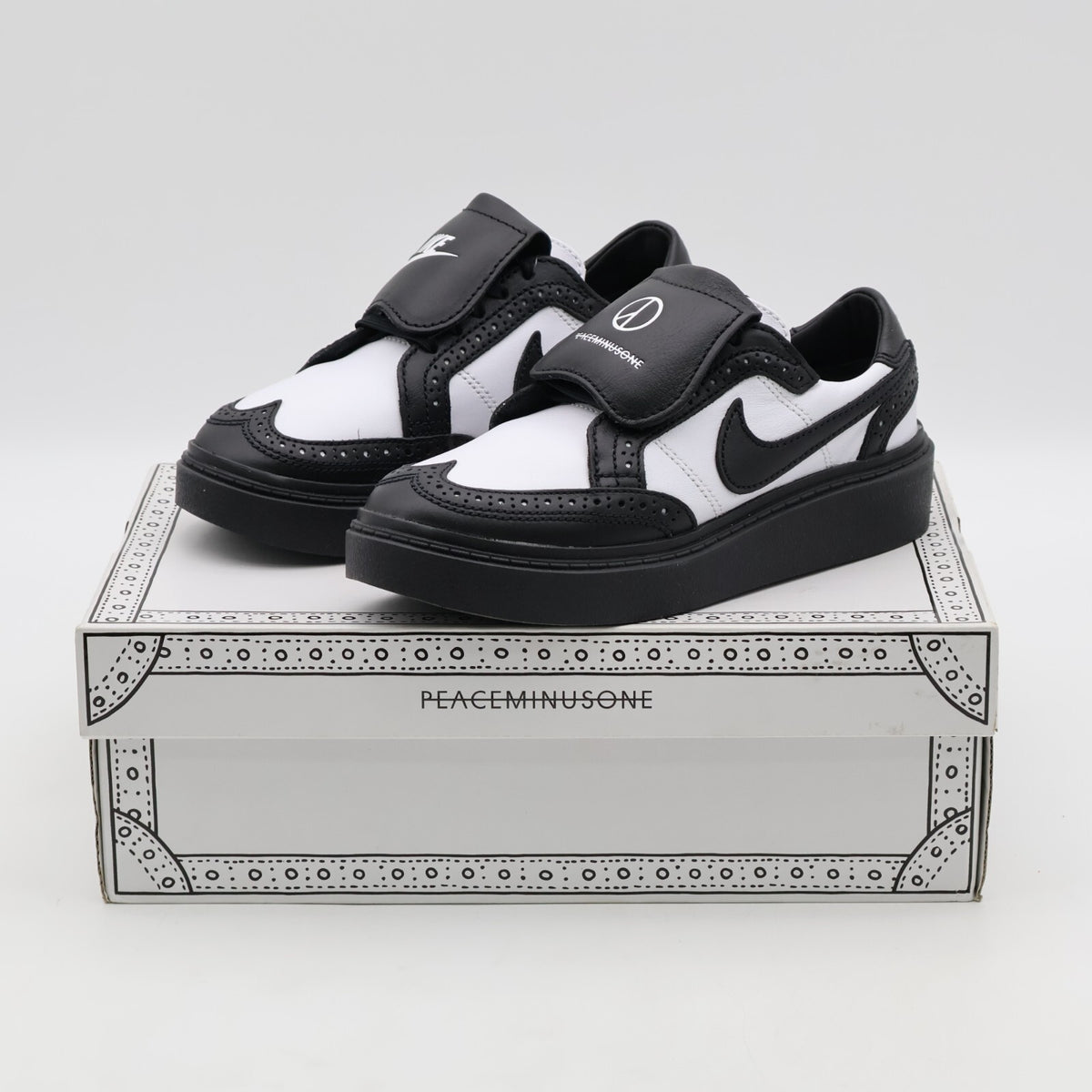 DH2482-101 PEACEMINUSONE Ã Nike Kwondo 1 G-Dragon Panda Wingtip Leather Dress