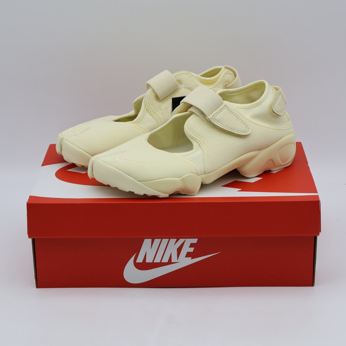 IV6058-700 Nike Air Rift Neo "Sunbleach" (Women's)
