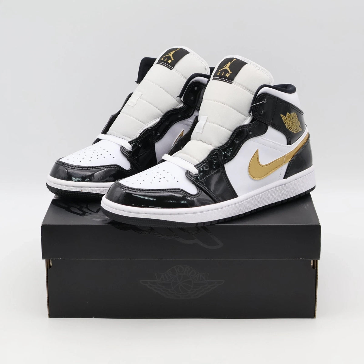 Size 11 - 852542-007 Jordan 1 Mid SE Patent Black Gold (Men's)