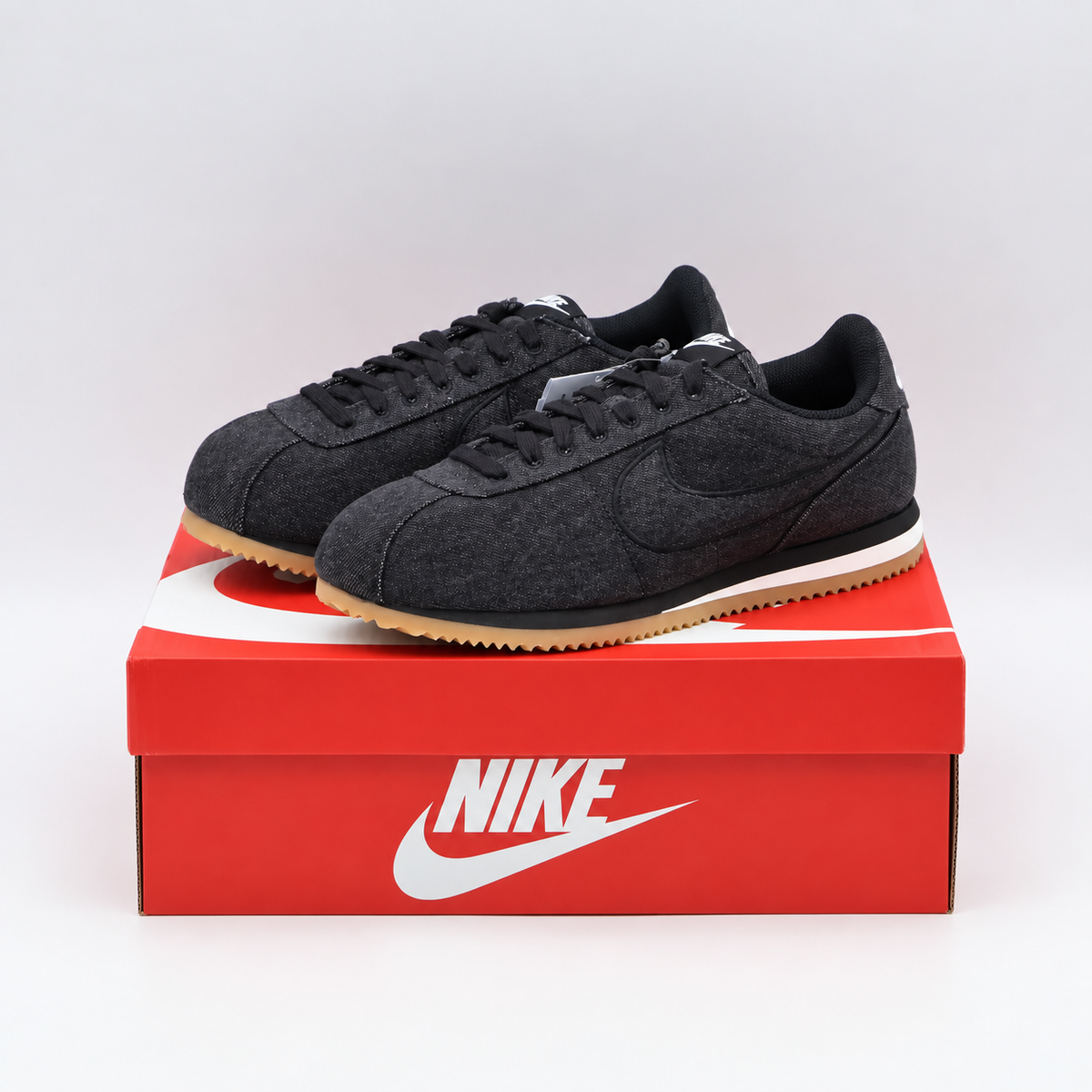 IM8052-010 Nike Women's Cortez TXT Black Denim (Women's)