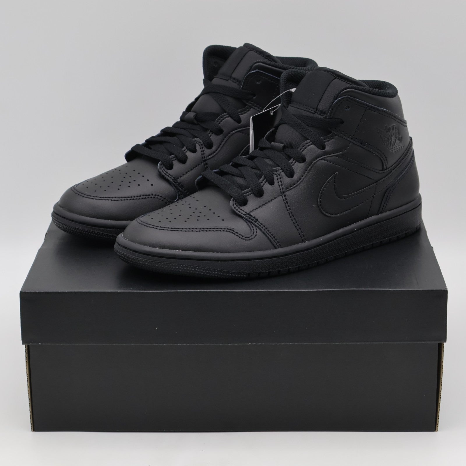 554724-093 Nike Air Jordan 1 Mid Triple Black (Men's)