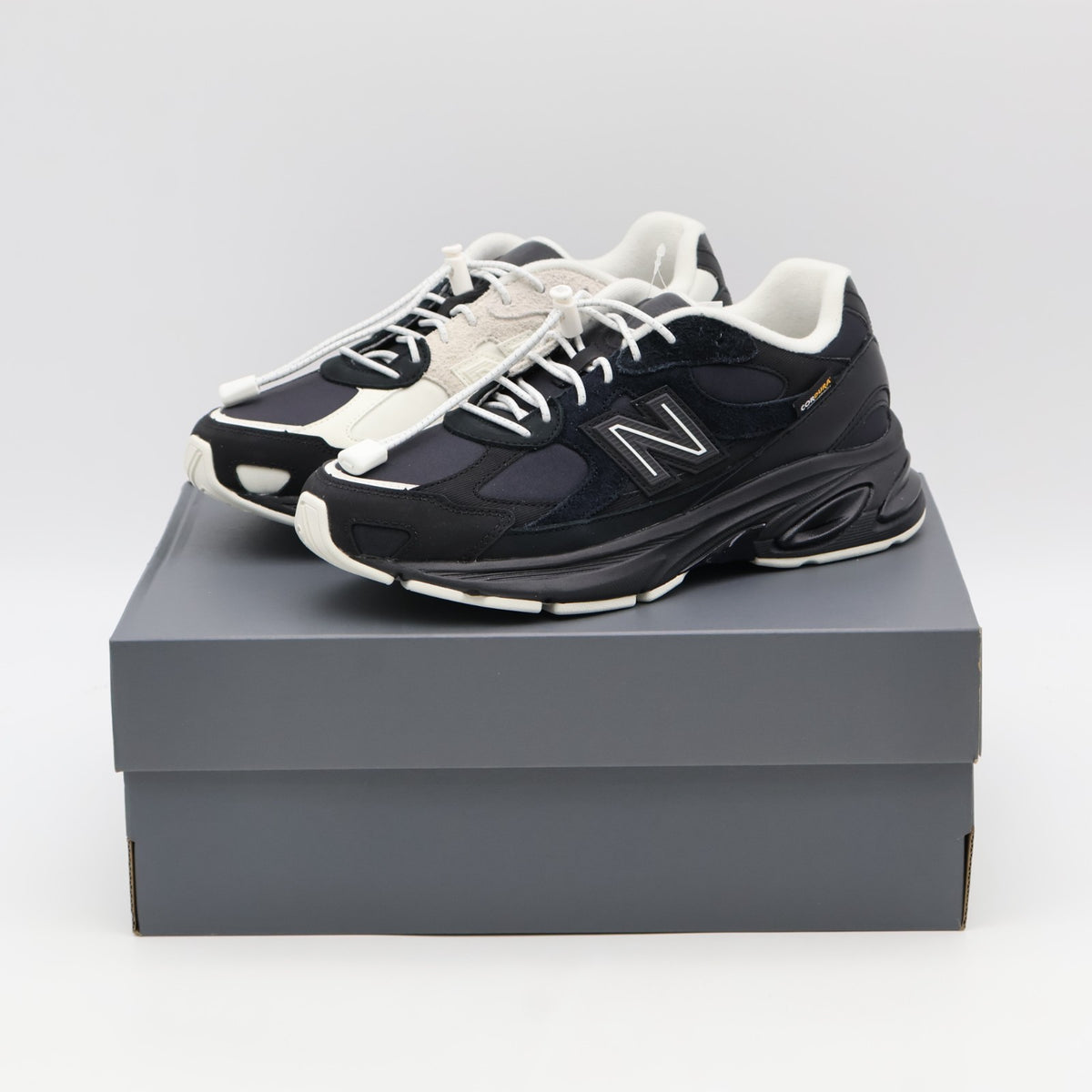 U20108ZK DOE Ã New Balance 2010 "Black/Sea Salt" (Men's)