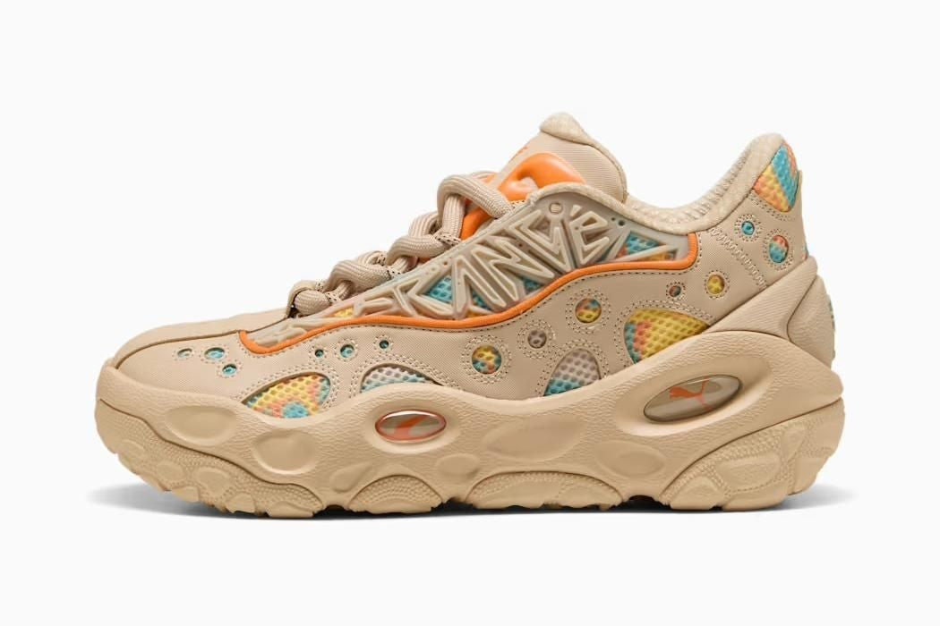 312165-01 LaMelo Ball à Puma La France RNR Light Sand Orange Glo Aquatic (Men's)
