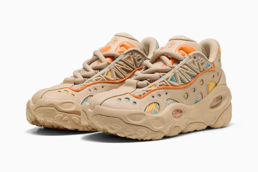 312165-01 LaMelo Ball à Puma La France RNR Light Sand Orange Glo Aquatic (Men's)