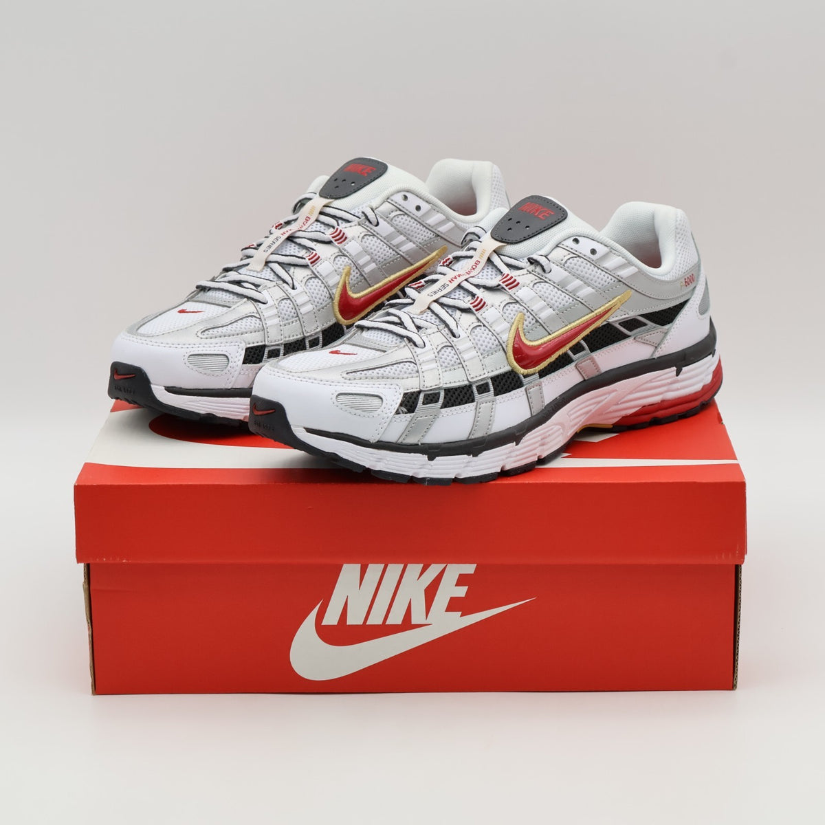 BV1021-101 Nike P-6000 White Varsity Red (Women's)
