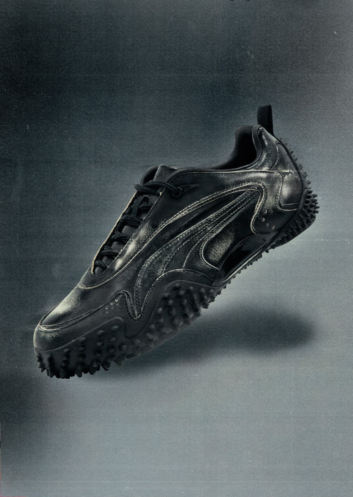 407039-01 GADID ANONIEM Puma Mostro XC PUMA Black (Men's)