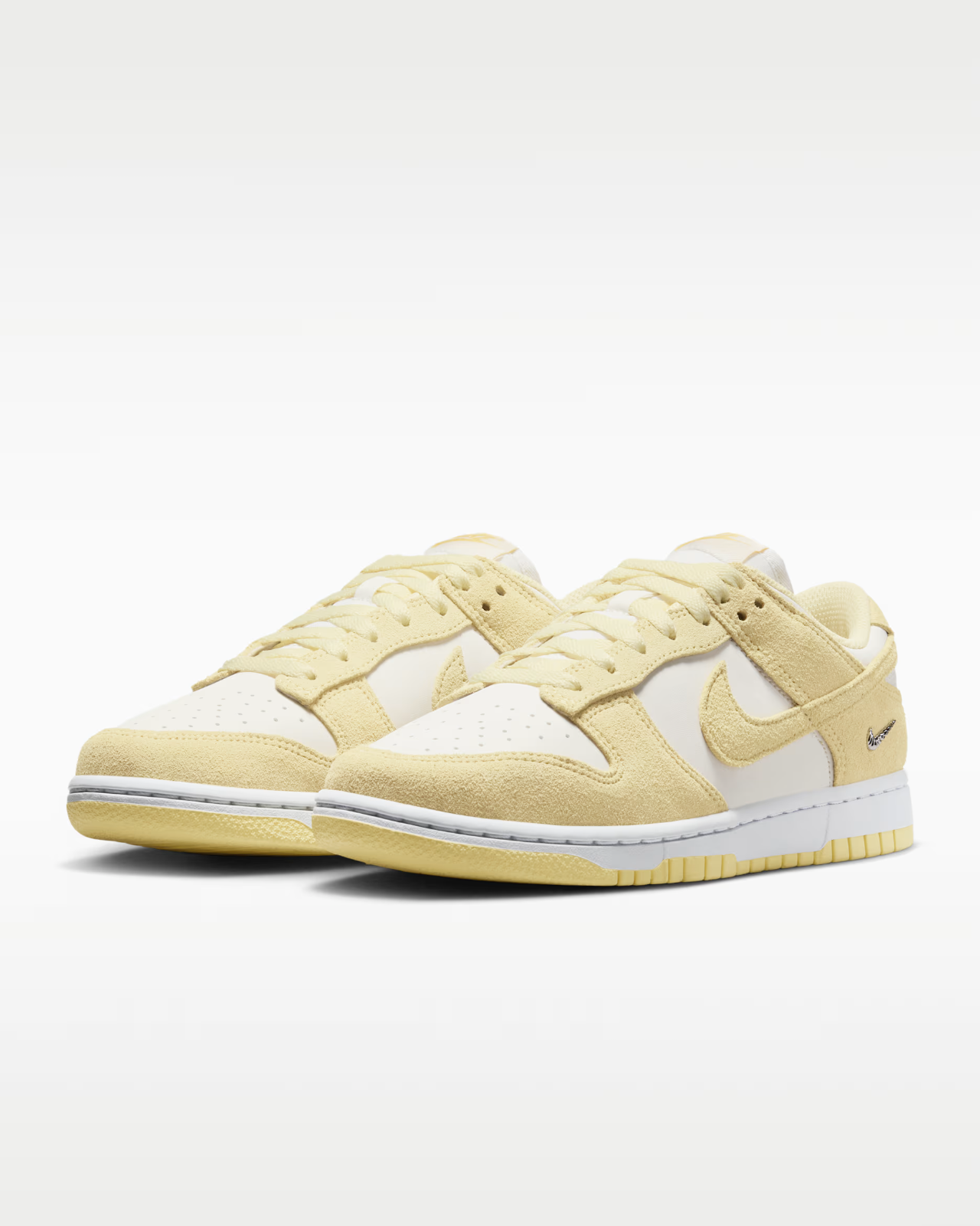 IO4244-104 Nike Dunk Low "Sail/Soft Yellow" (Women's)