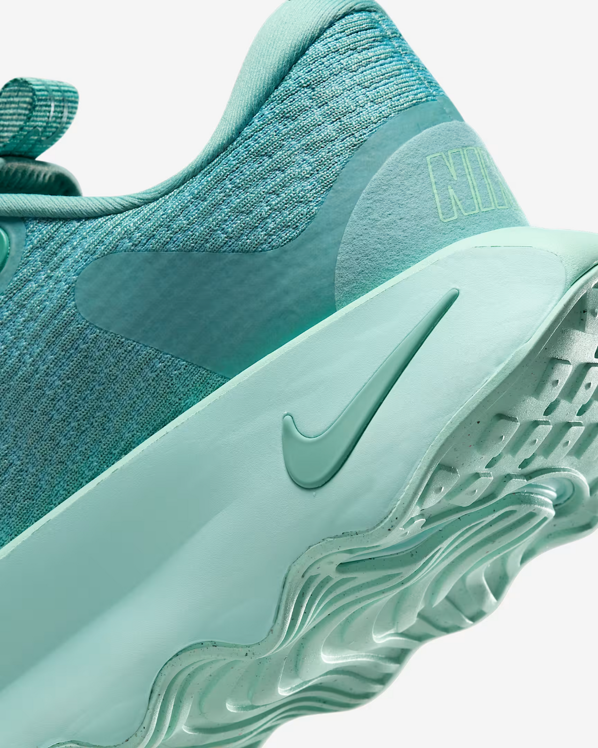 DV1238-011 Nike Motiva Cannon Mineral Jade Ice  (Women's)
