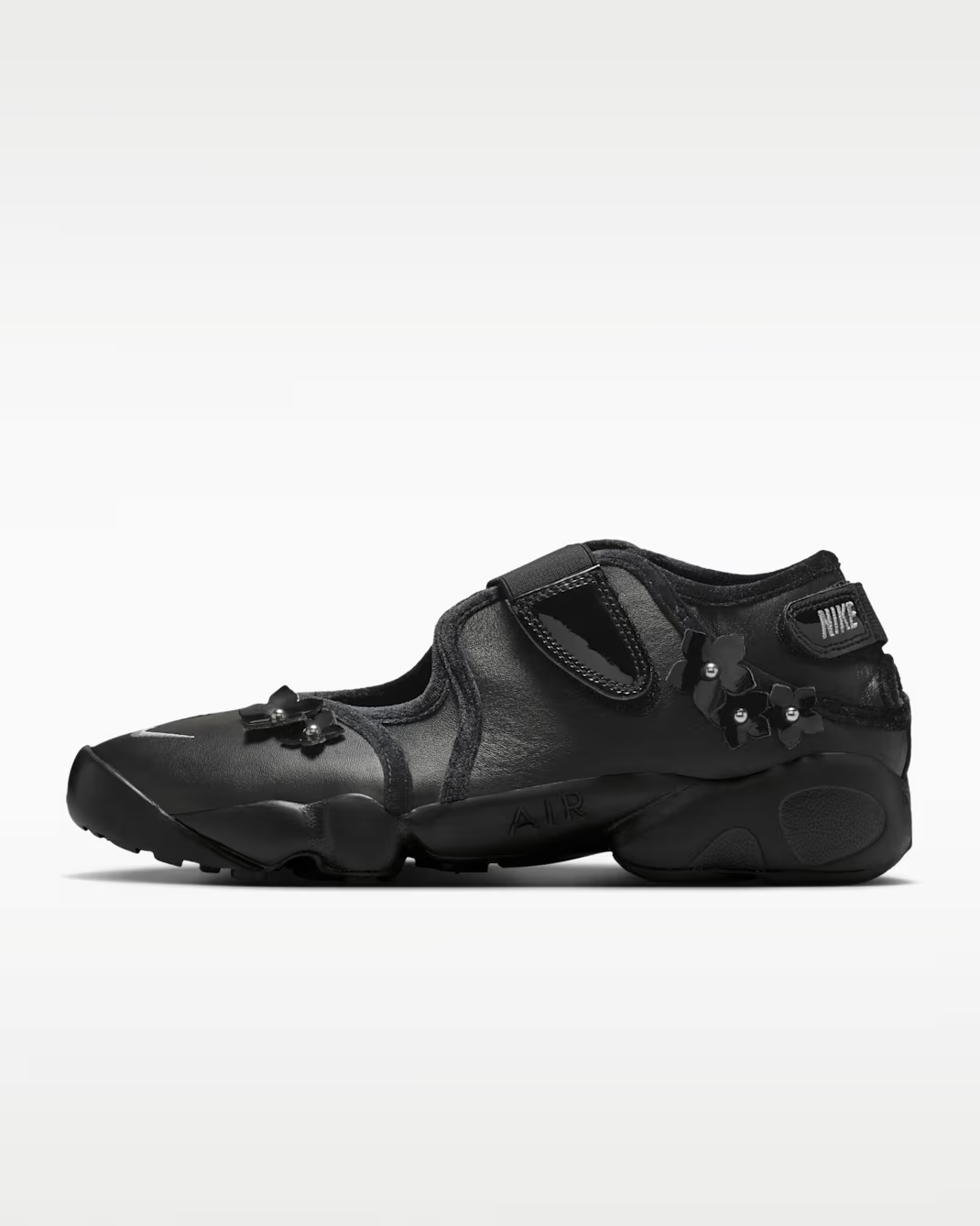 IV5682-001 Nike Air Rift Leather "Black Flowers" (Women's)