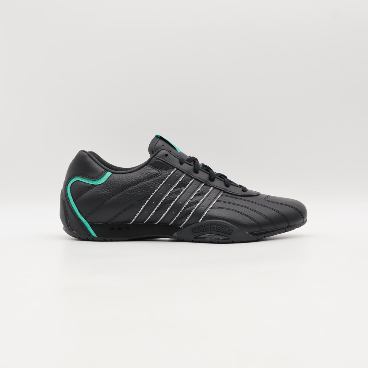 JR4543 Mercedes AMG PETRONAS F1 Team adidas Adiracer Lo Core Black Semi (Men's)