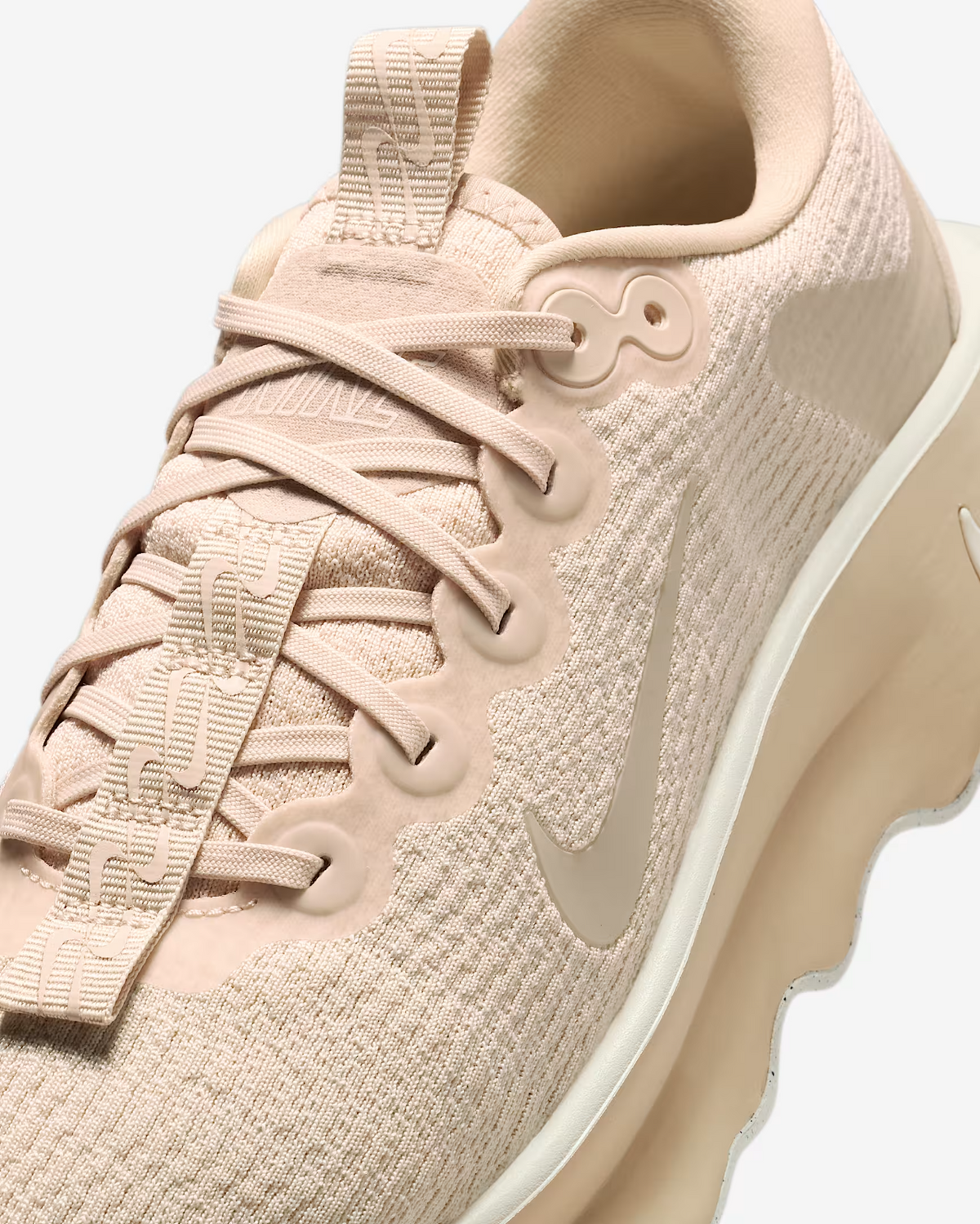 DV1238-110 Nike Motiva Sanddrift Pearl White Pale Ivory (Women's)