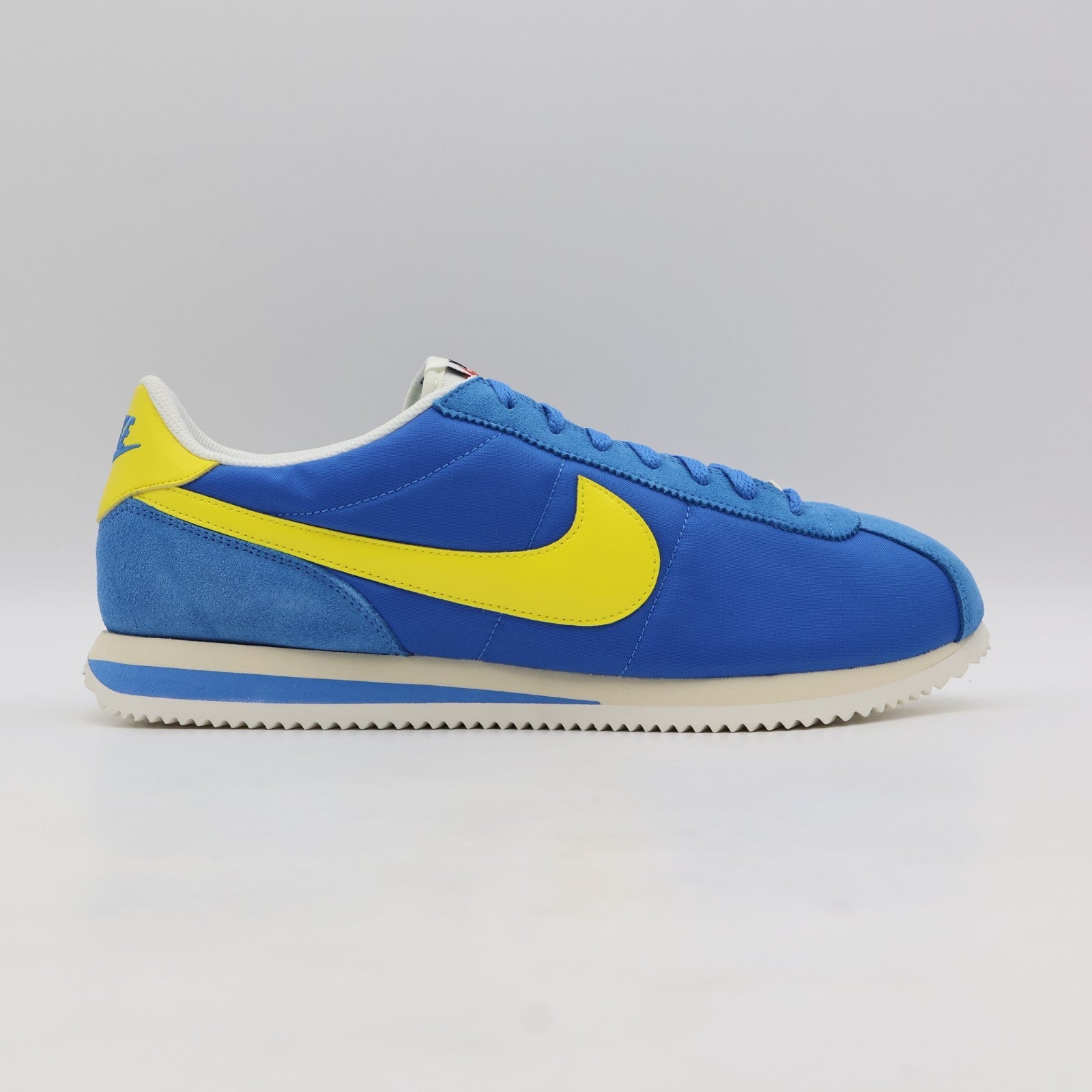 HF0263-402 Nike Cortez TXT Blue Yellow (Men's)