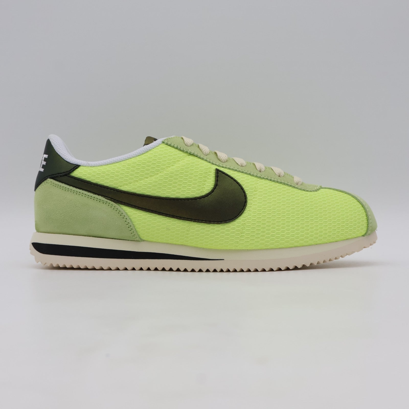 IB8135-736 NIKE CORTEZ TXT LT LEMON TWIST/BLACK-COCONUT MILK-WHITE (Men's)