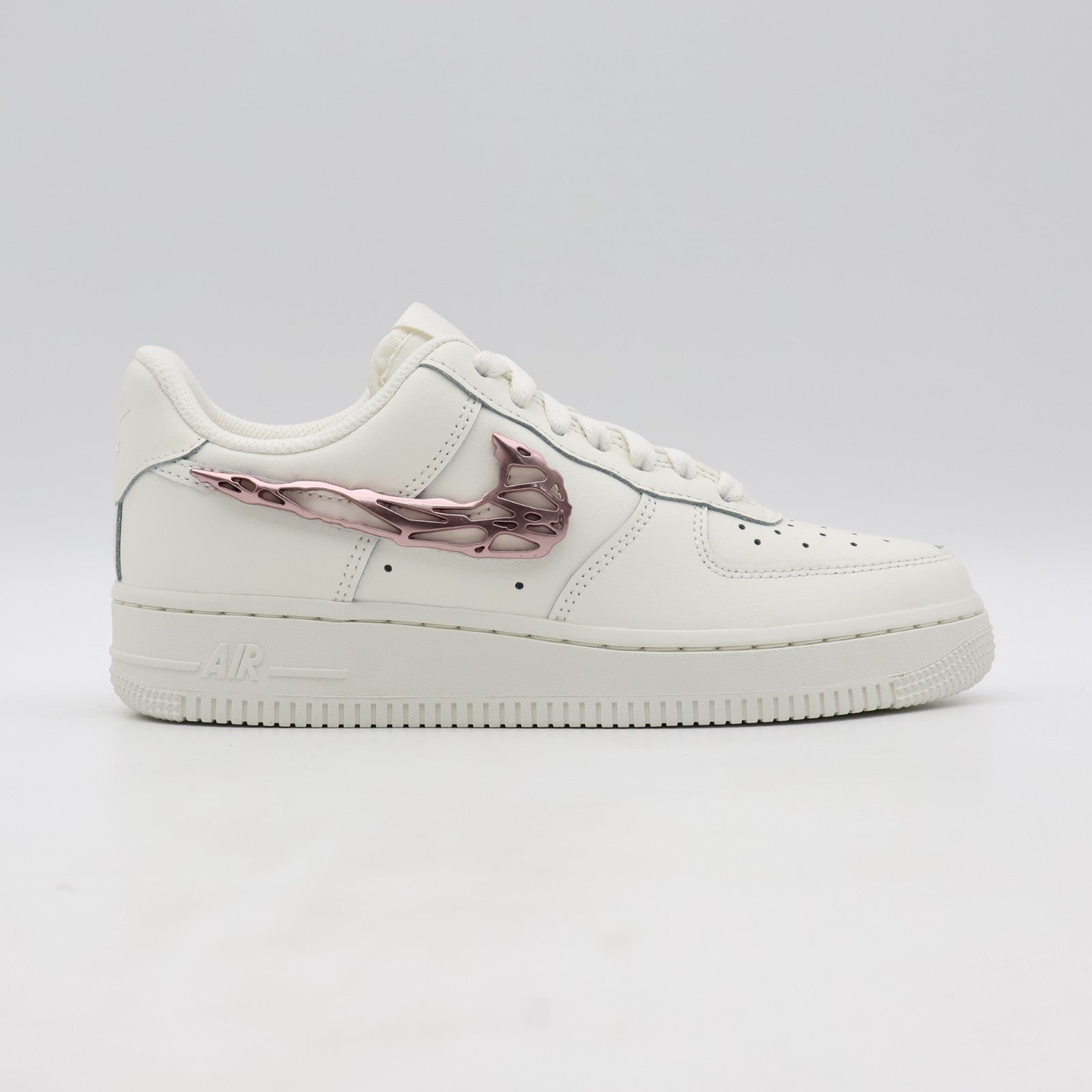 IF1686-161 Nike Air Force 1 Low Metallic Pink Swooshes (Women's)