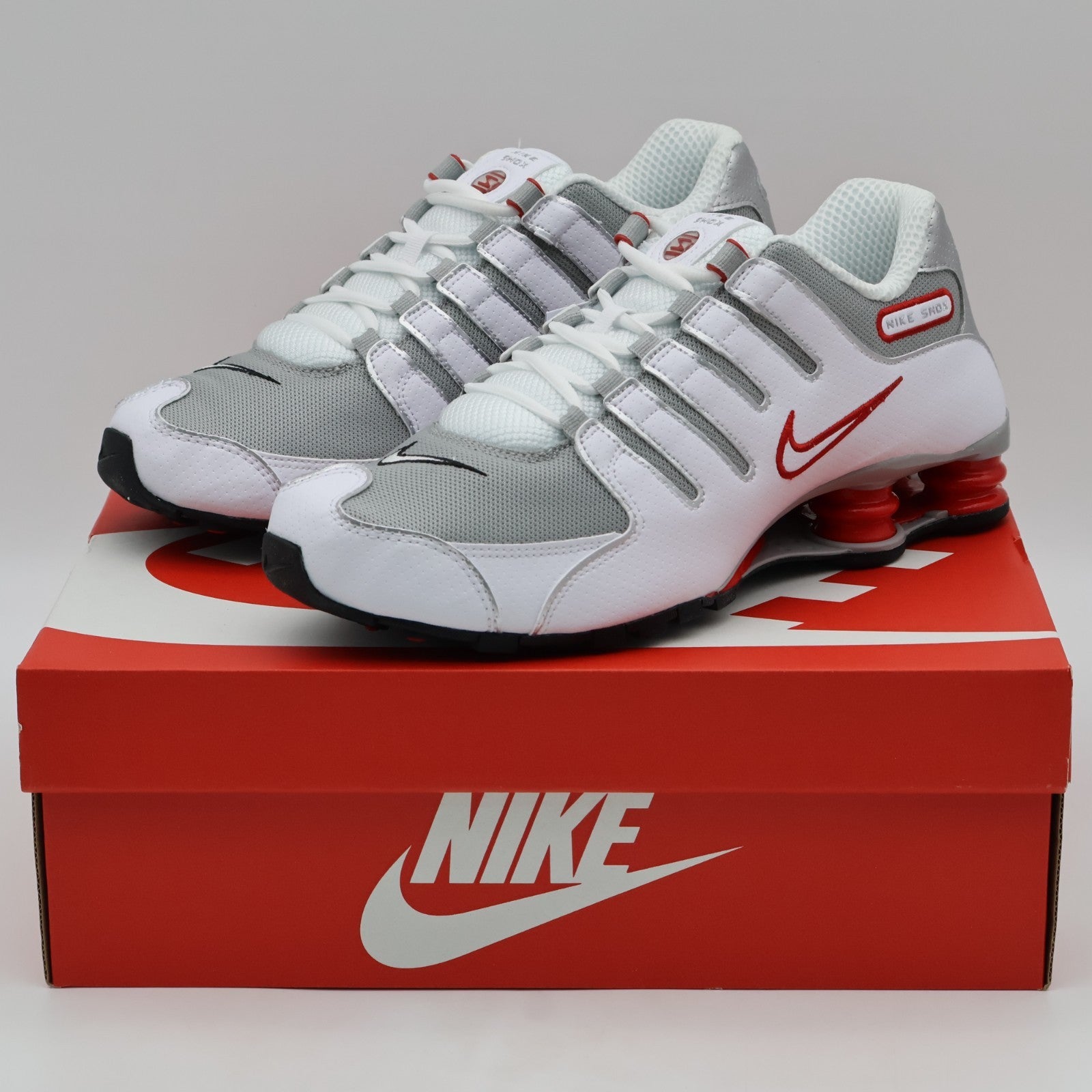378341-104 Nike Shox NZ Shoes White  Sport Red  Cool Grey  (Menâs)