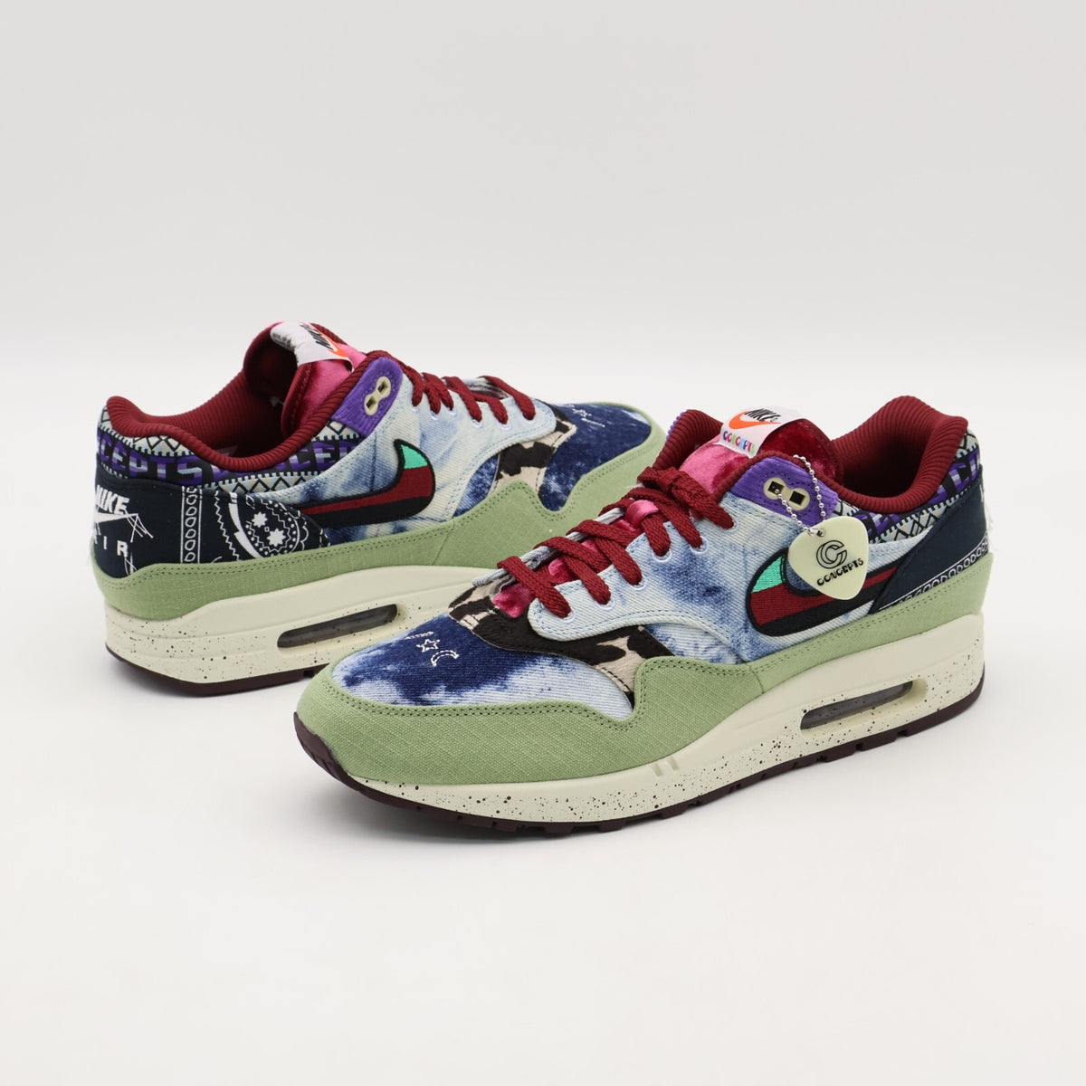 DN1803-300 Concepts Nike Air Max 1 Mellow Oil Green Black Team Red Sail (Men's)