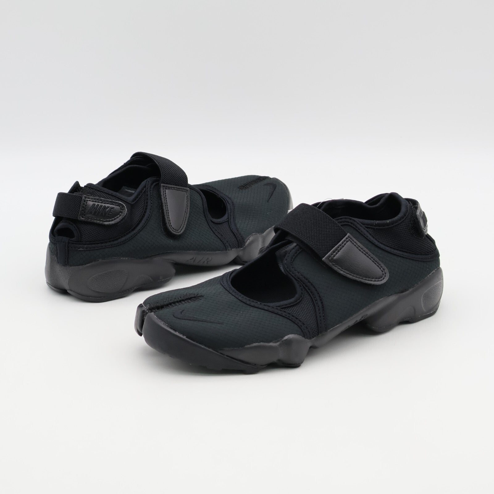 DN1338-004 Nike Air Rift Breathe Black White Black (Women's)