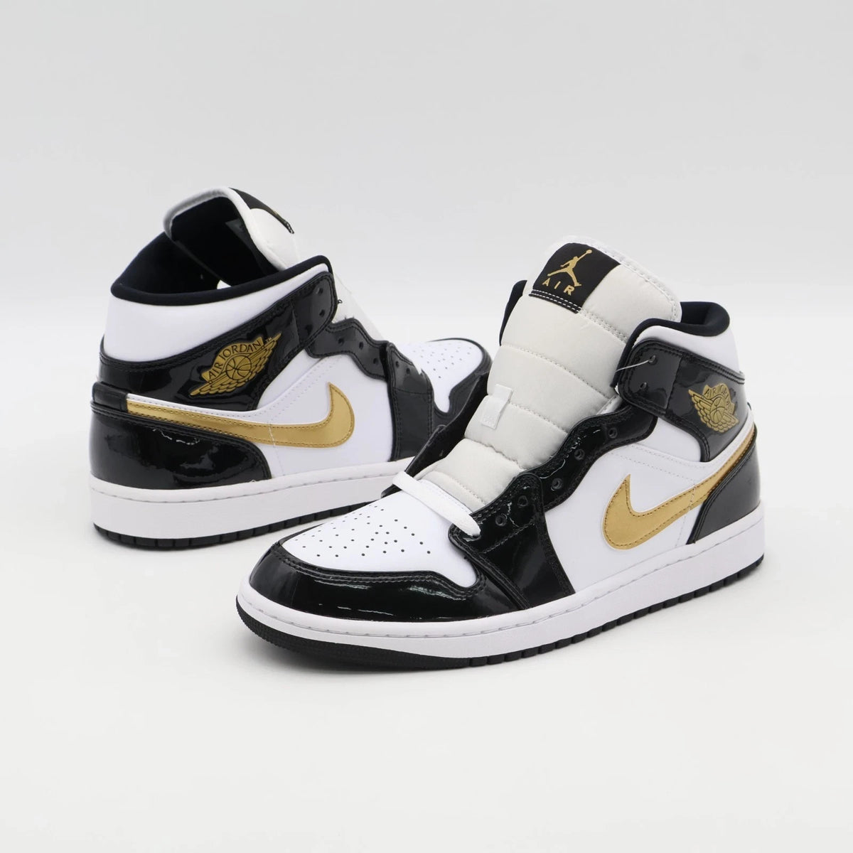 Size 11 - 852542-007 Jordan 1 Mid SE Patent Black Gold (Men's)