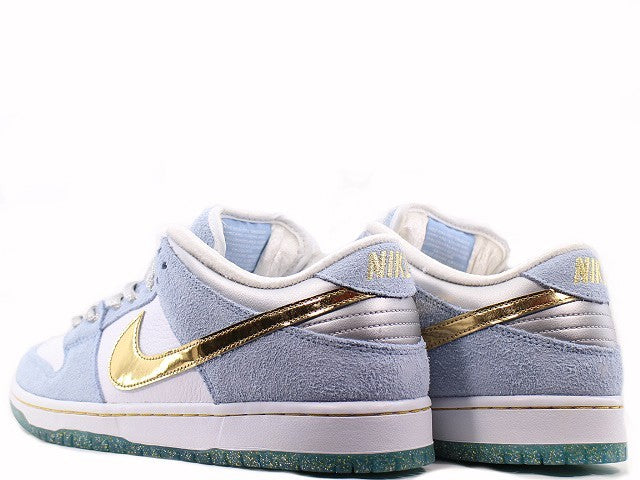 DC9936-100 Sean Cliver Ã Nike SB Dunk Low "Holiday Special" (Men's)