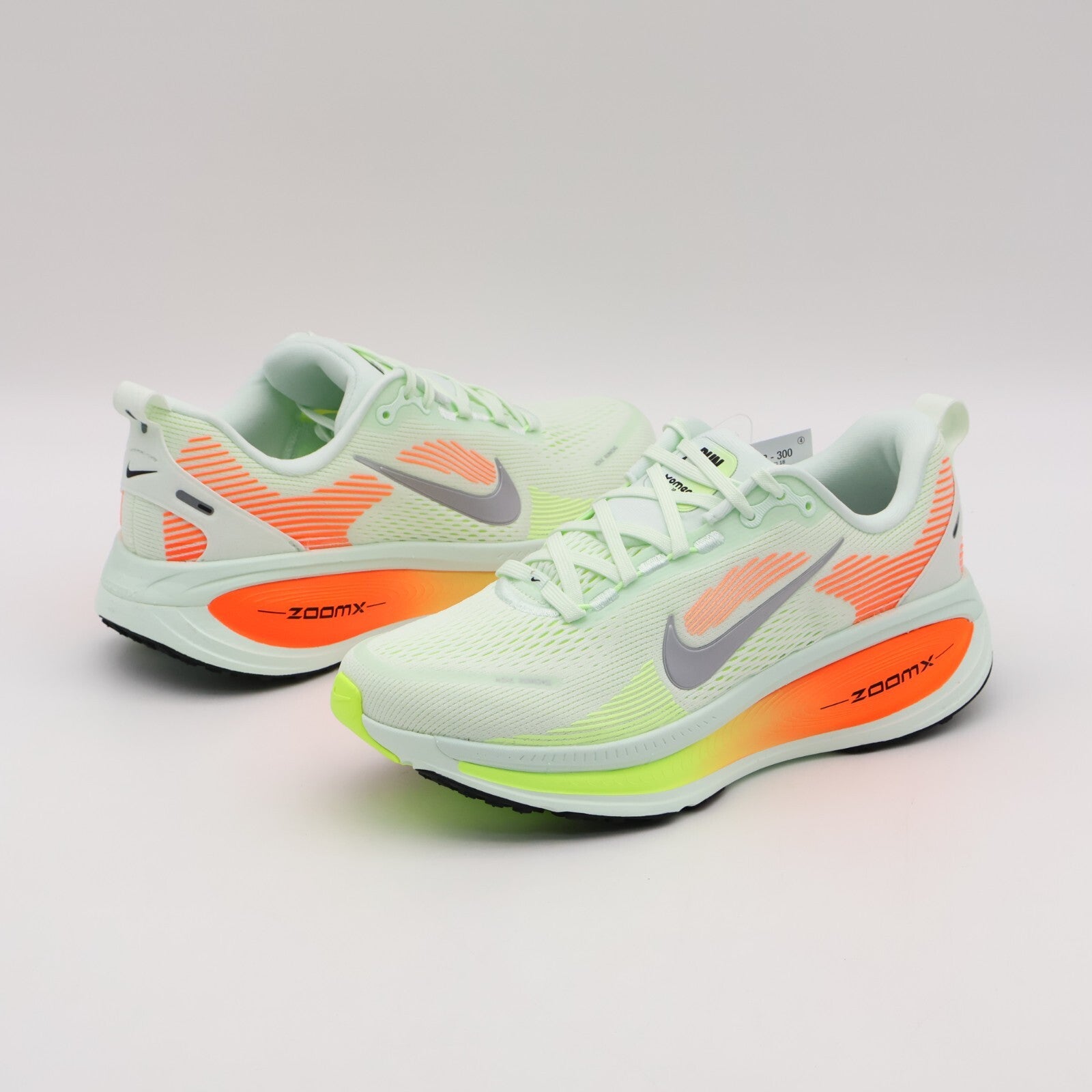 HM6803-300 Nike Vomero 18 Barely Green Hyper Crimson Barely Volt (Men's)