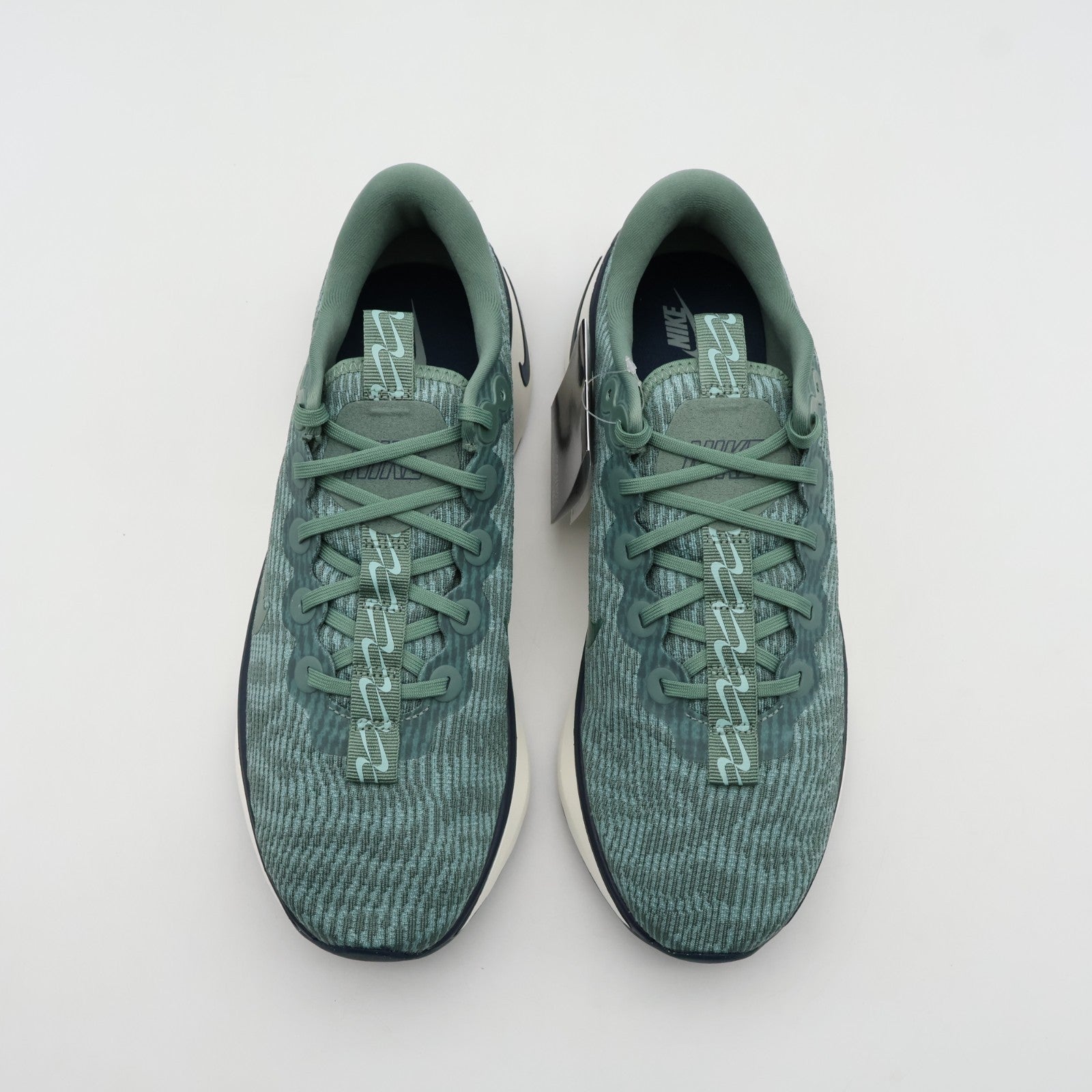 DV1237-301 Nike Motiva Clay Green Cannon Armory Navy Clay Green (Men's)