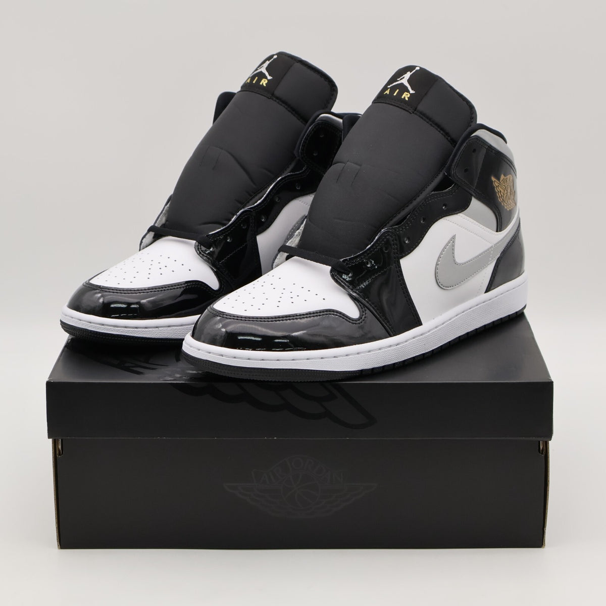 HV0789-010 Nike Air Jordan 1 Mid Black Patent (Men's)