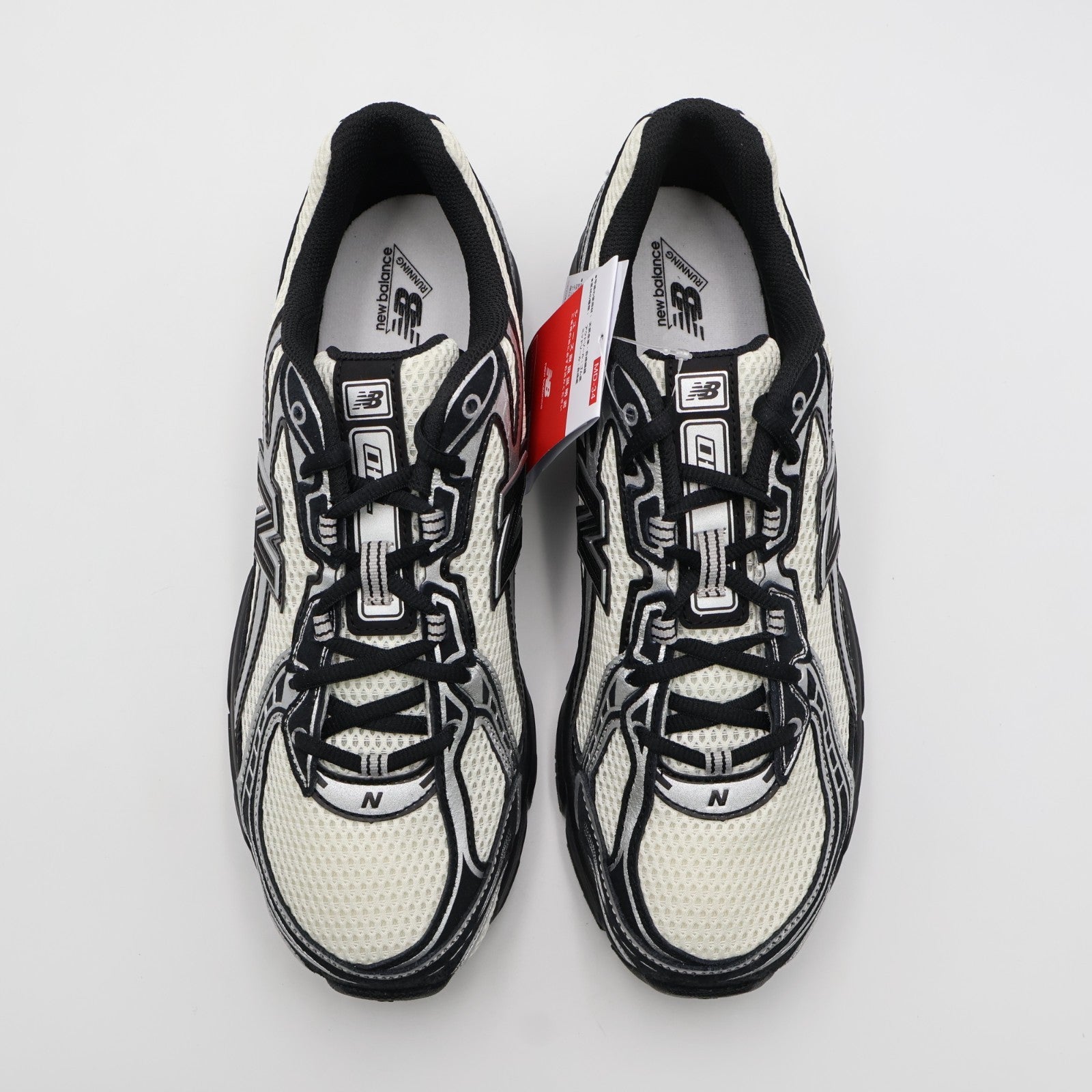 U7407XT New Balance 740 Black/Angora/Silver Metallic (Men's)