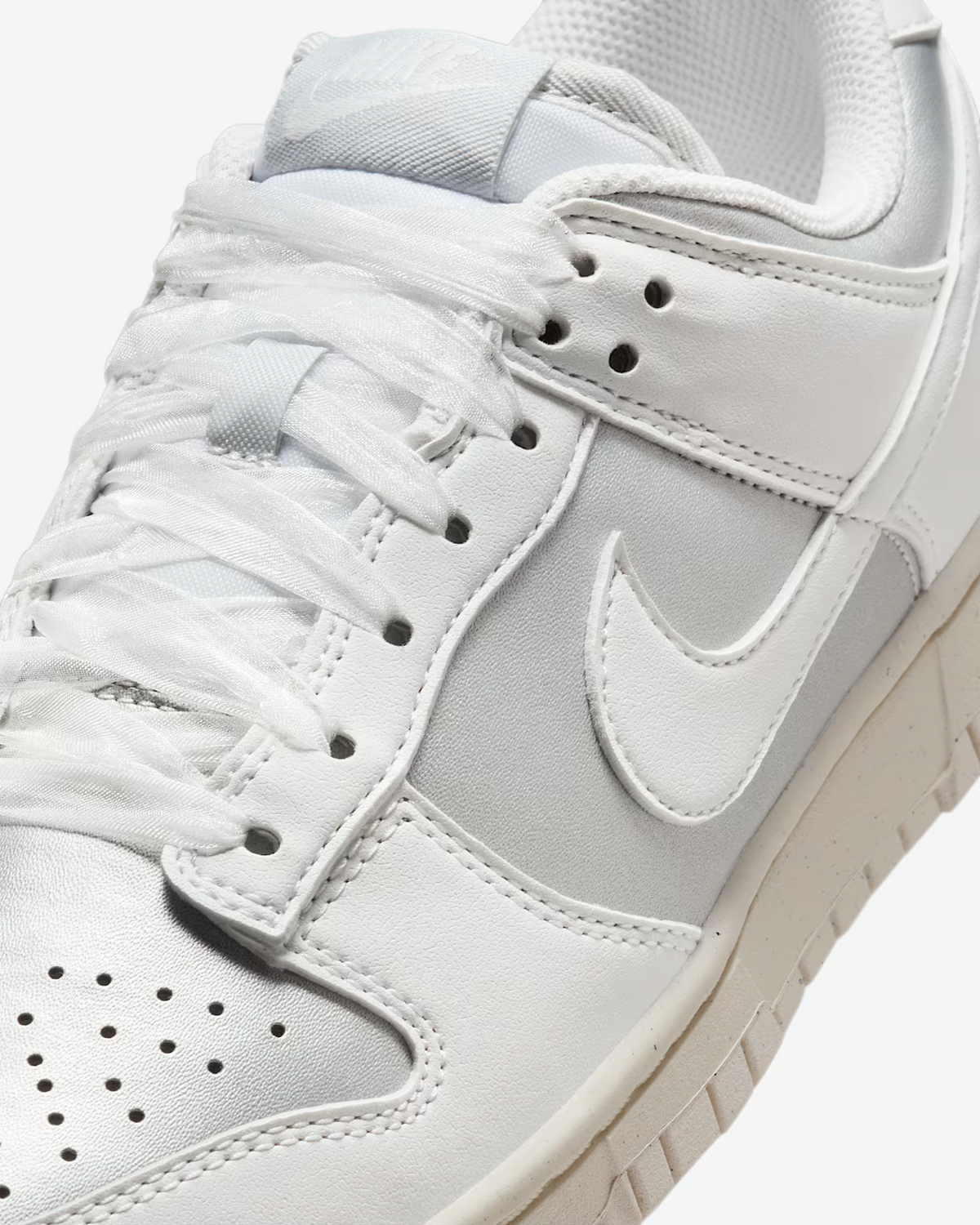 IB7311-001 Nike  Dunk Low Next Nature Metallic Platinum (Women's)