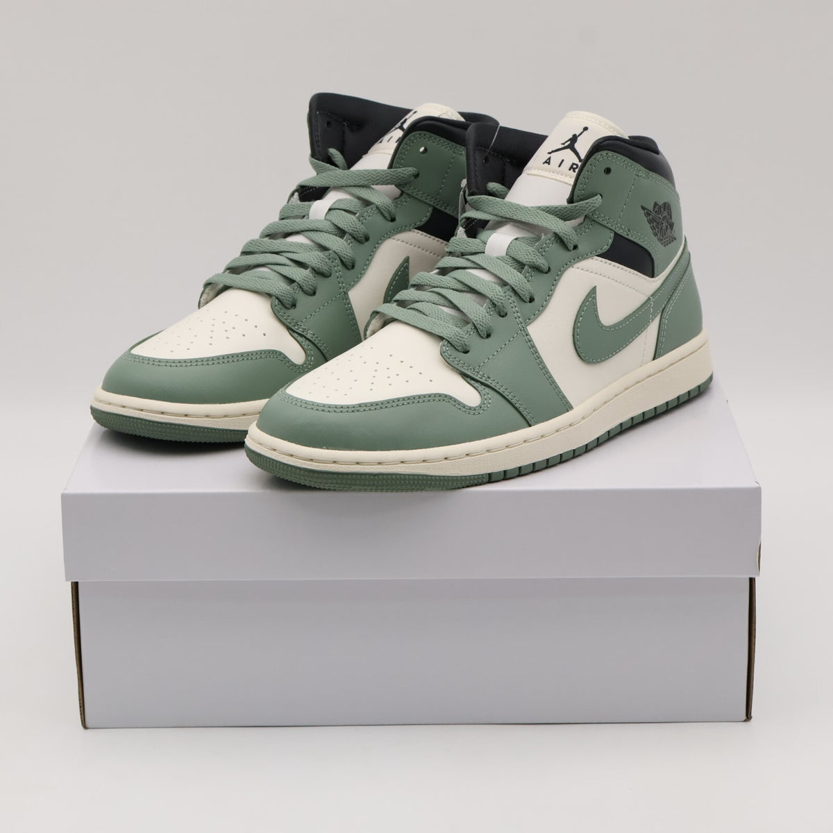 BQ6472-130 Nike Air Jordan 1 Mid Jade Smoke (Women's)