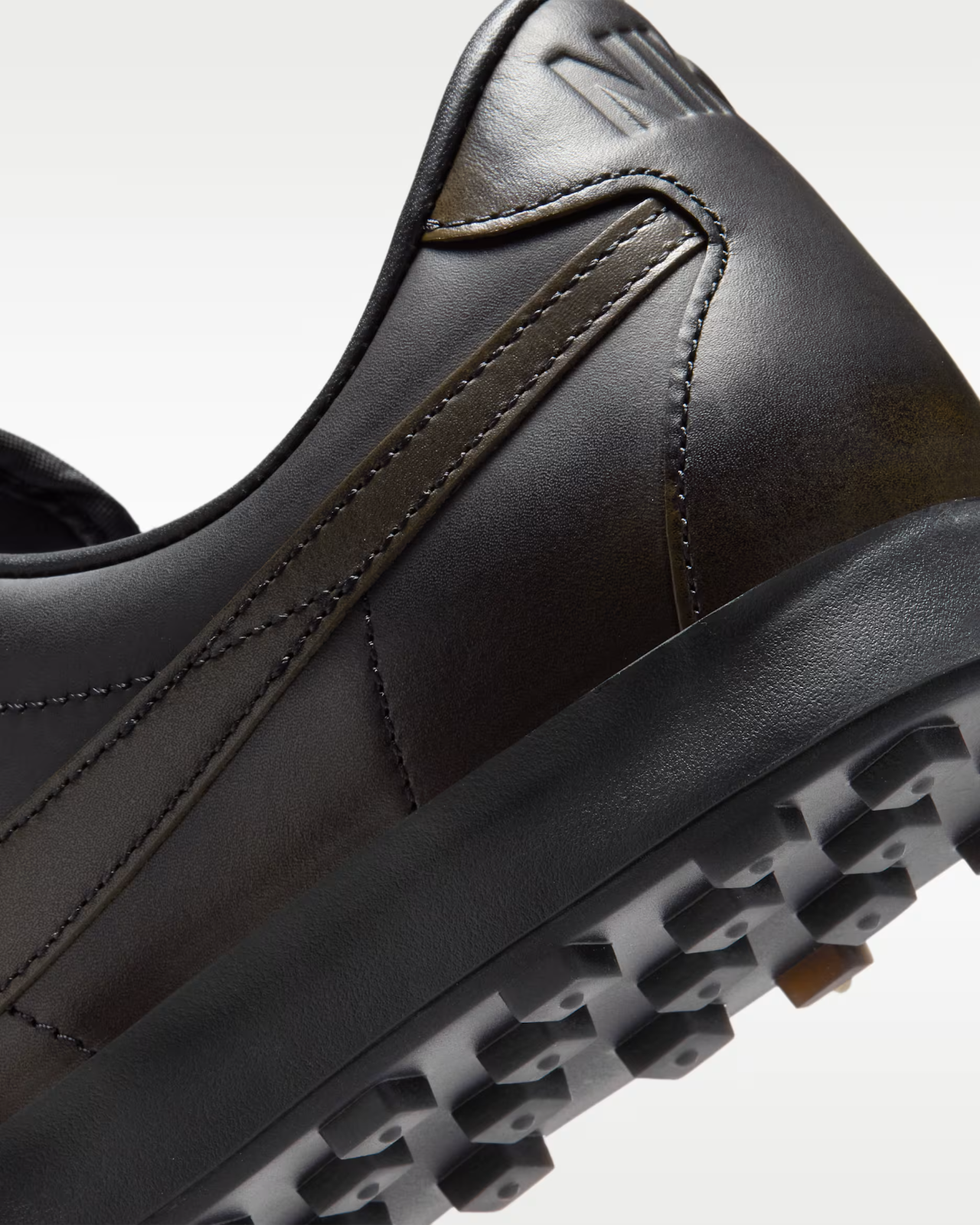 IO9910-001 Nike Astrograbber "Black" (Men's)