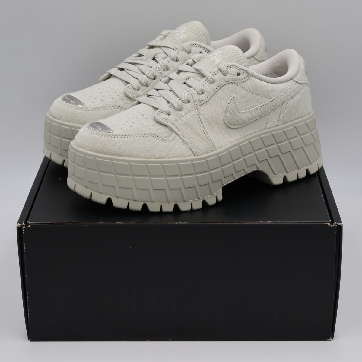 IB7210-001 Nike Air Jordan 1 Brooklyn Low Light Bone Metallic Silver (Women's)