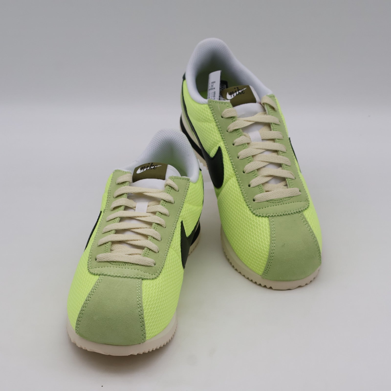 IB8135-736 NIKE CORTEZ TXT LT LEMON TWIST/BLACK-COCONUT MILK-WHITE (Men's)