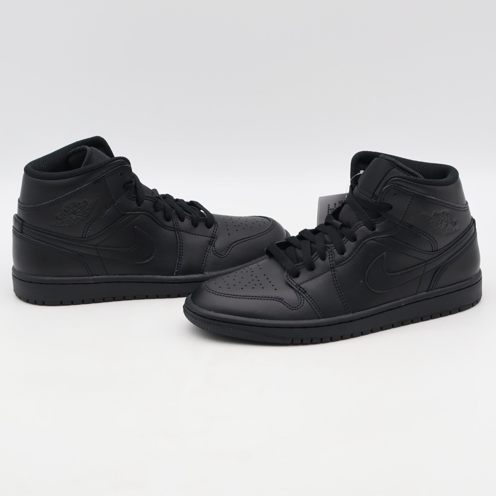 554724-093 Nike Air Jordan 1 Mid Triple Black (Men's)