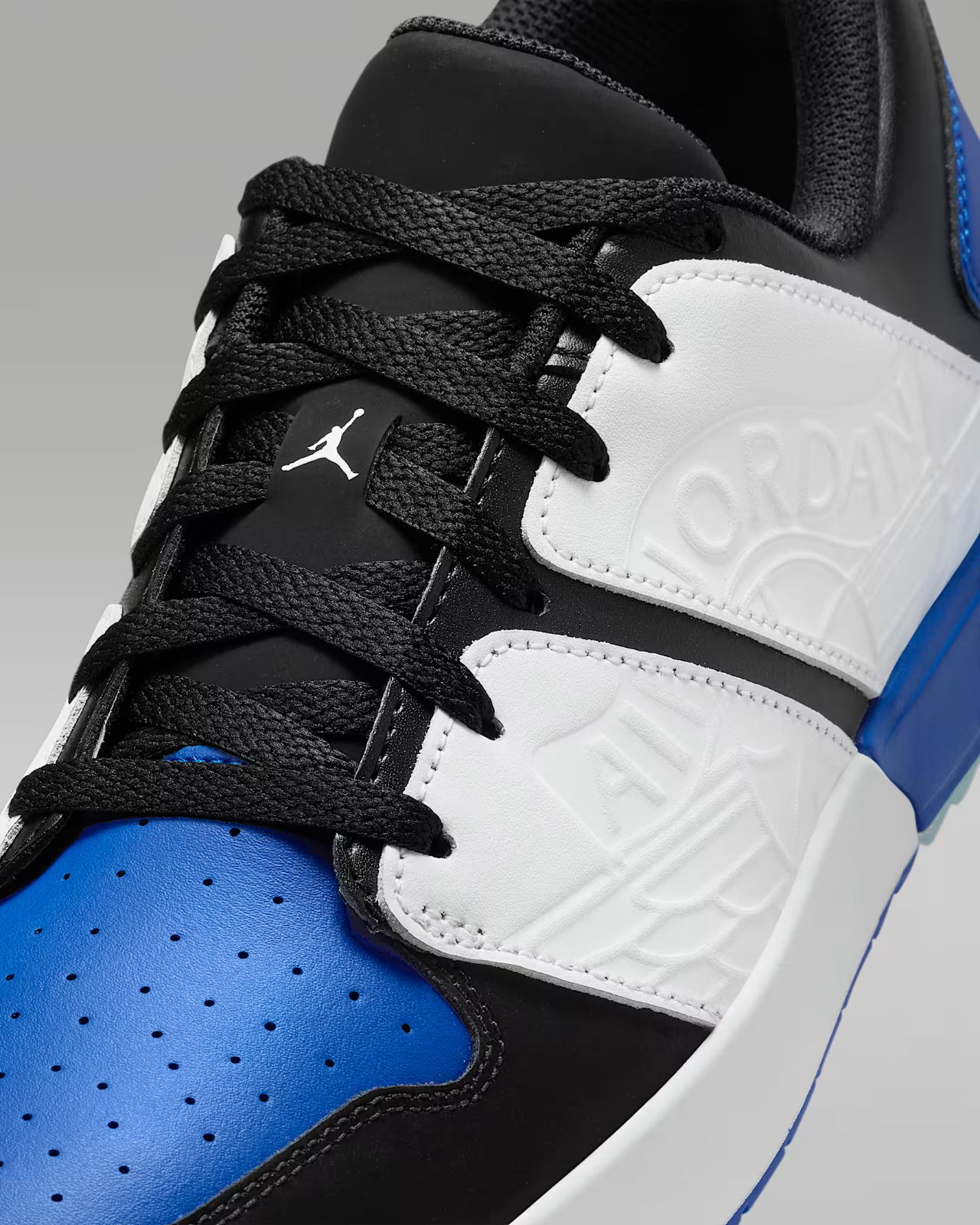 FZ4153-004 Nike Jordan Nu Retro 1 Black White Sport Royal (Men's)