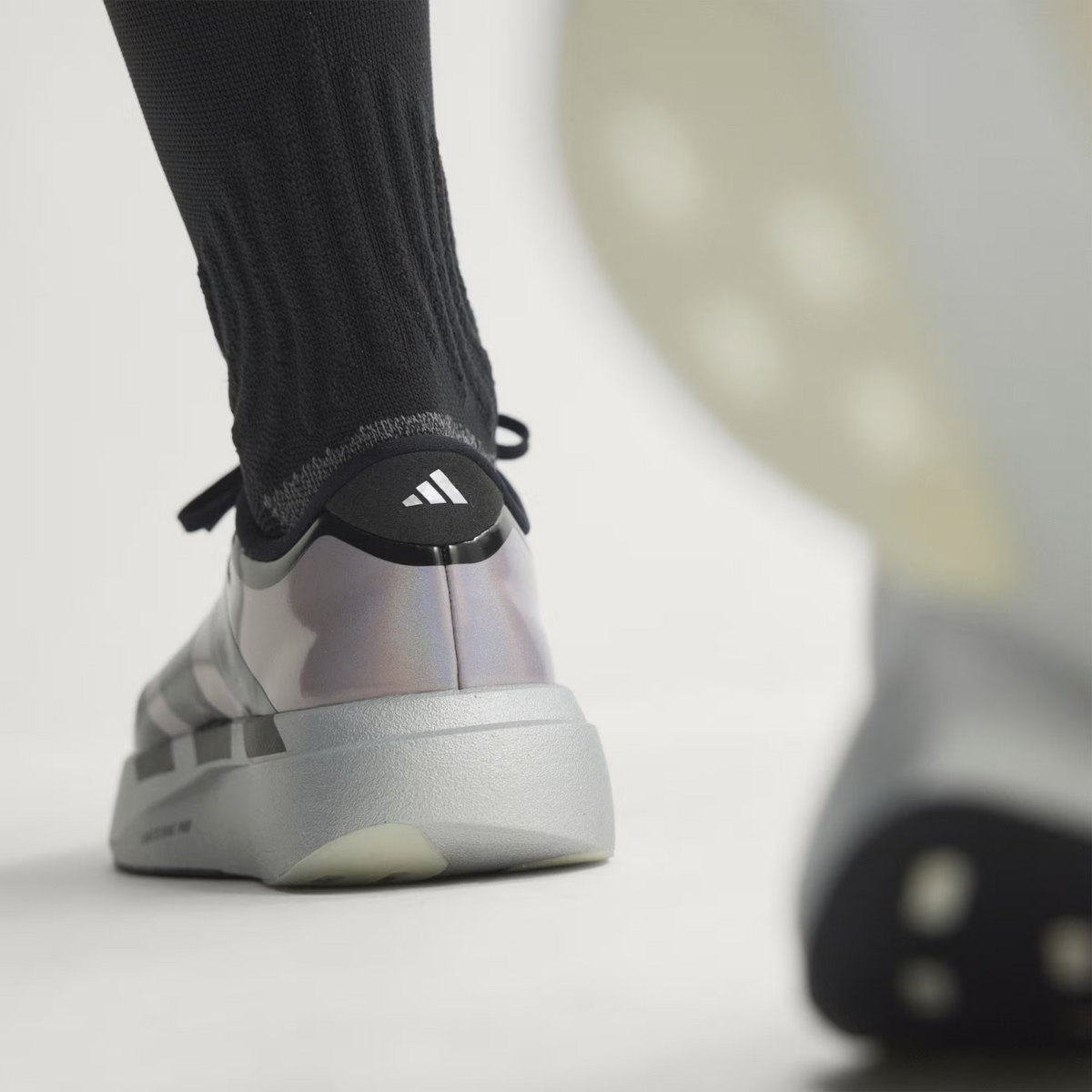 KH7788 adidas Adizero Evo SL Zip "Silver Metallic/Black" (Women's)
