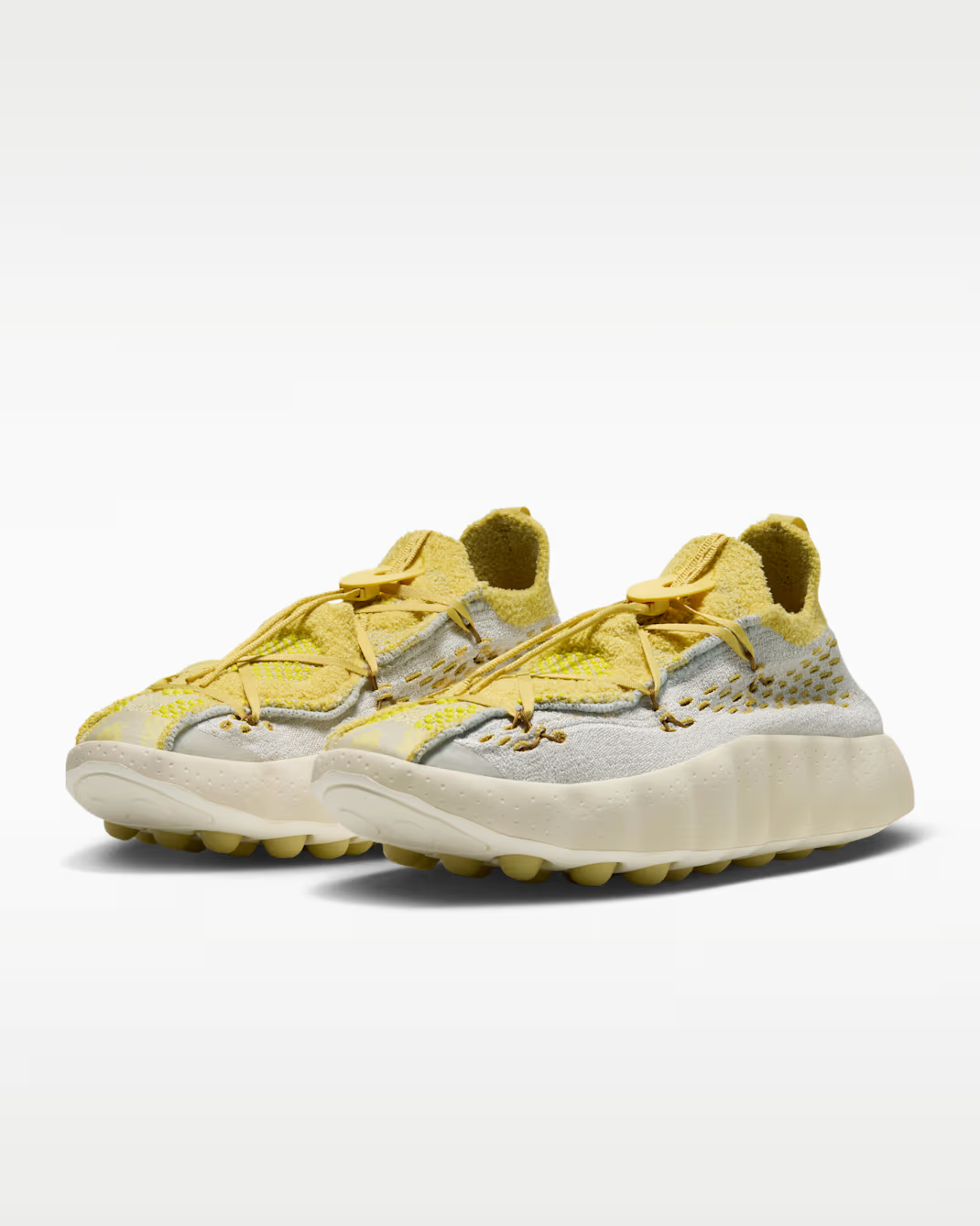 IR2176-003 Nike Mind 002 Flyknit "Light Bone/Saturn Gold" (Men's)
