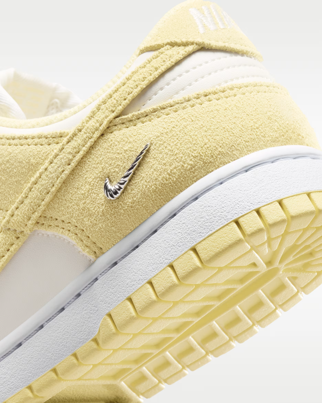 IO4244-104 Nike Dunk Low "Sail/Soft Yellow" (Women's)