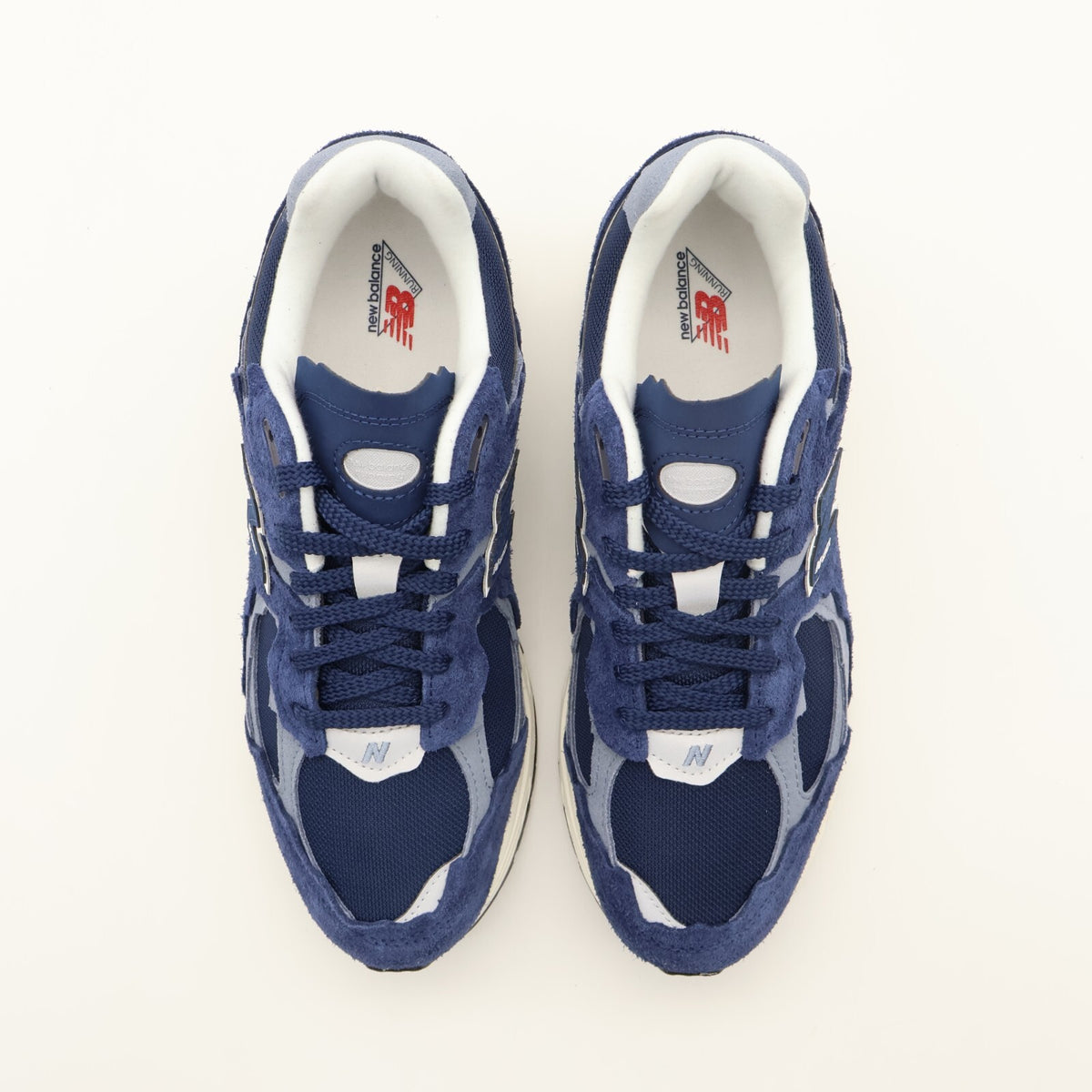 M2002RDK New Balance 2002R Protection Pack Navy Blue Grey White Sail Beige