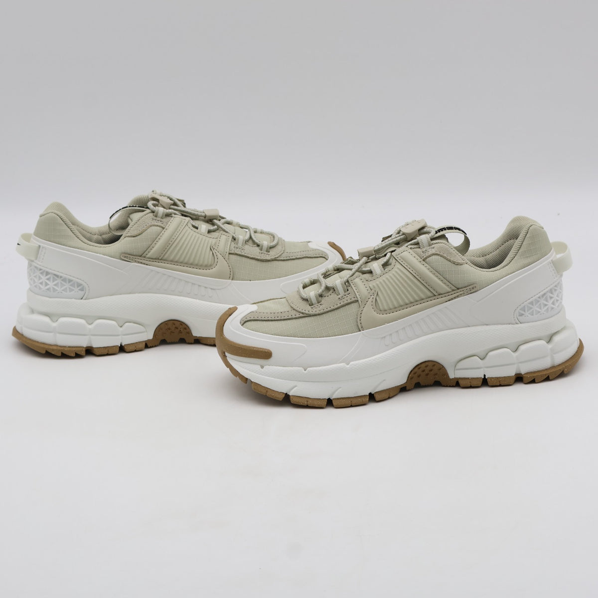 HQ2181-100 Nike Zoom Vomero Roam Sail Gum Light Brown Racer Blue (Women's)