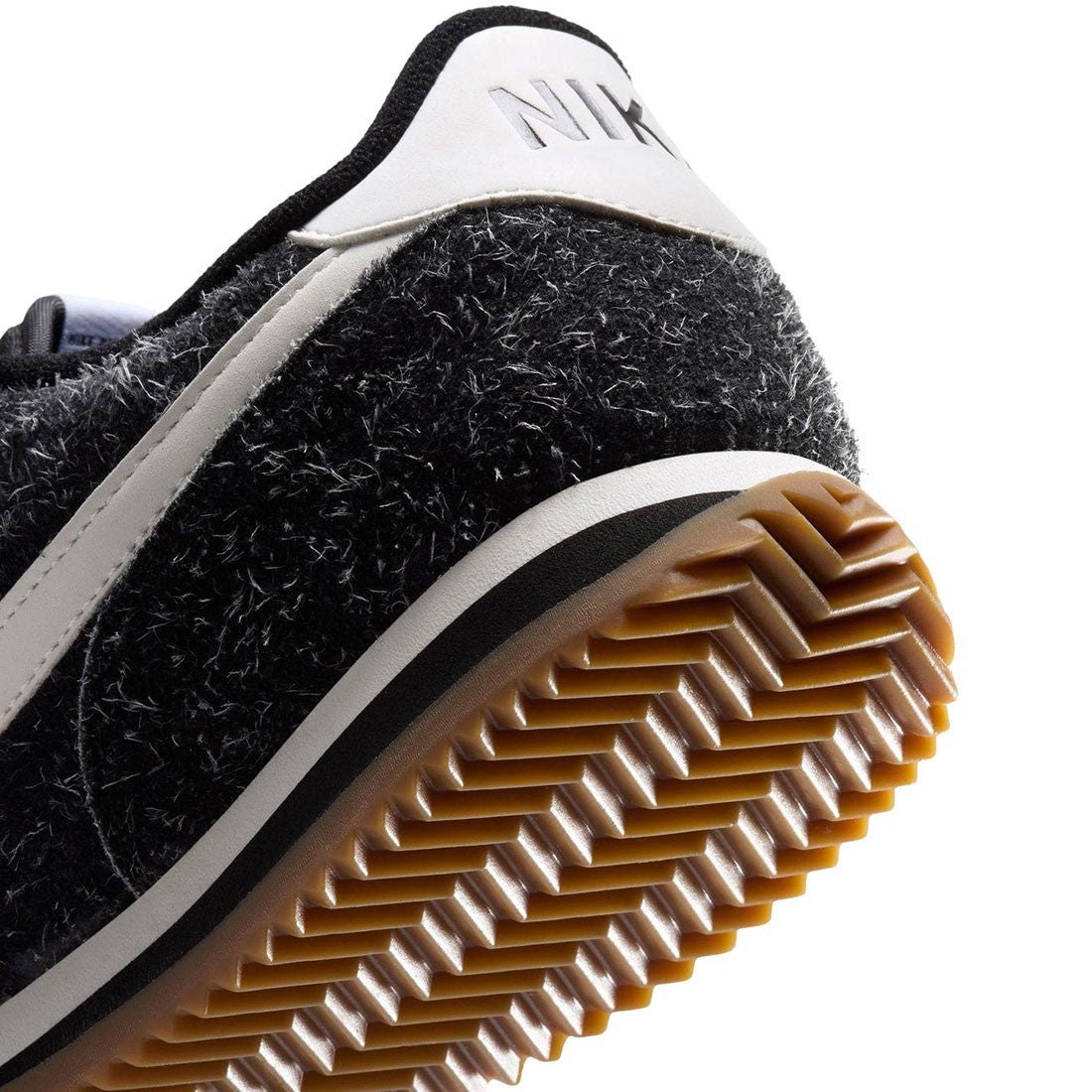 IQ0025-002  Nike Cortez Suede "Black/Sail" (Women's)
